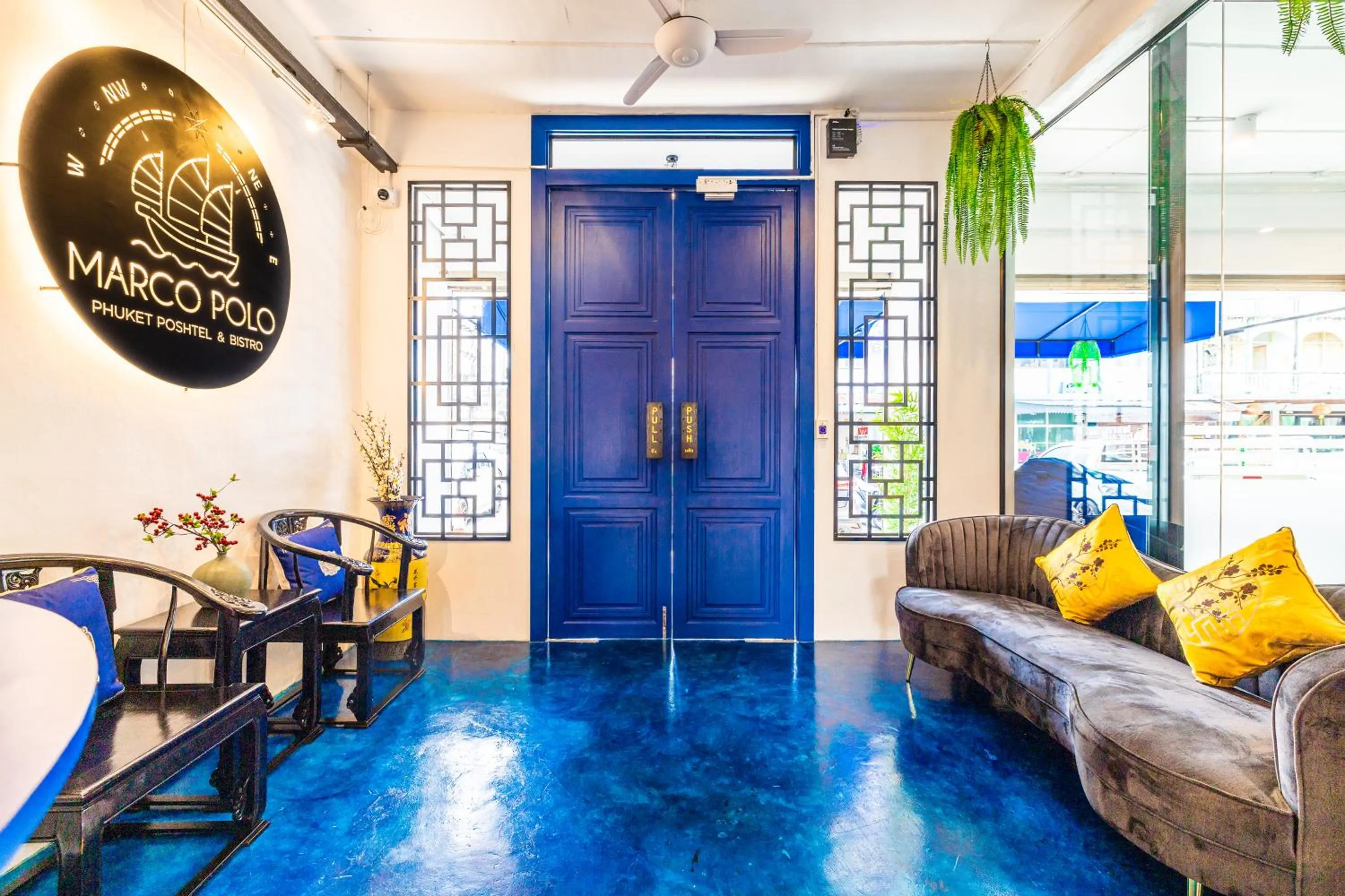 Living room in Marco Polo Phuket Poshtel & Bistro