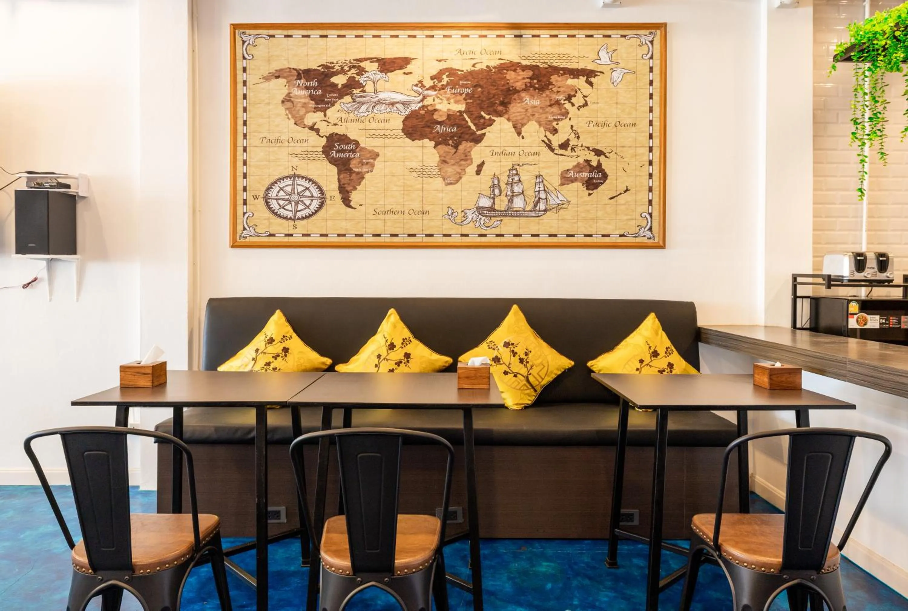 Dining area in Marco Polo Phuket Poshtel & Bistro