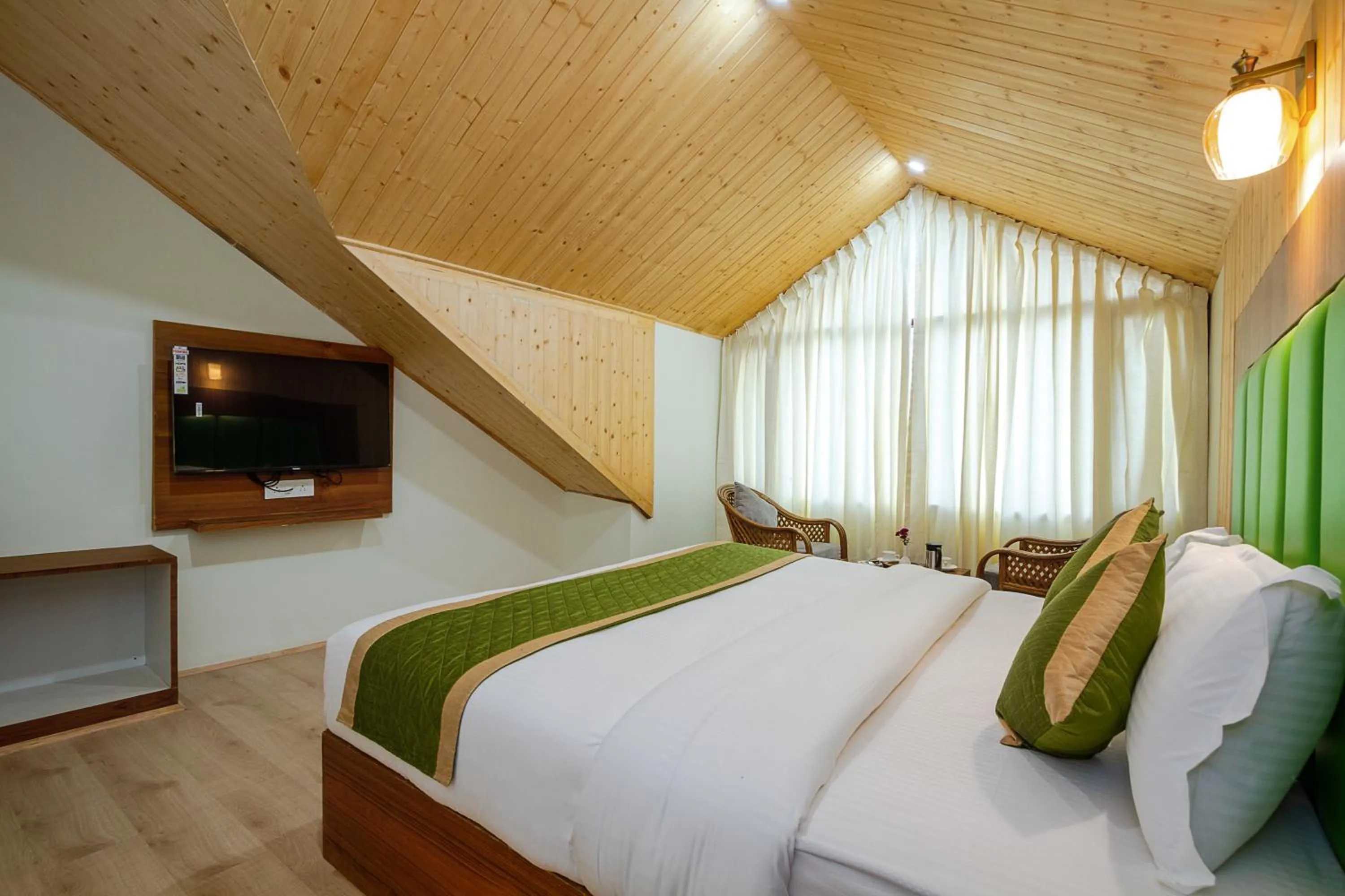 Bed in Tripli Hotels Drilbu Manali