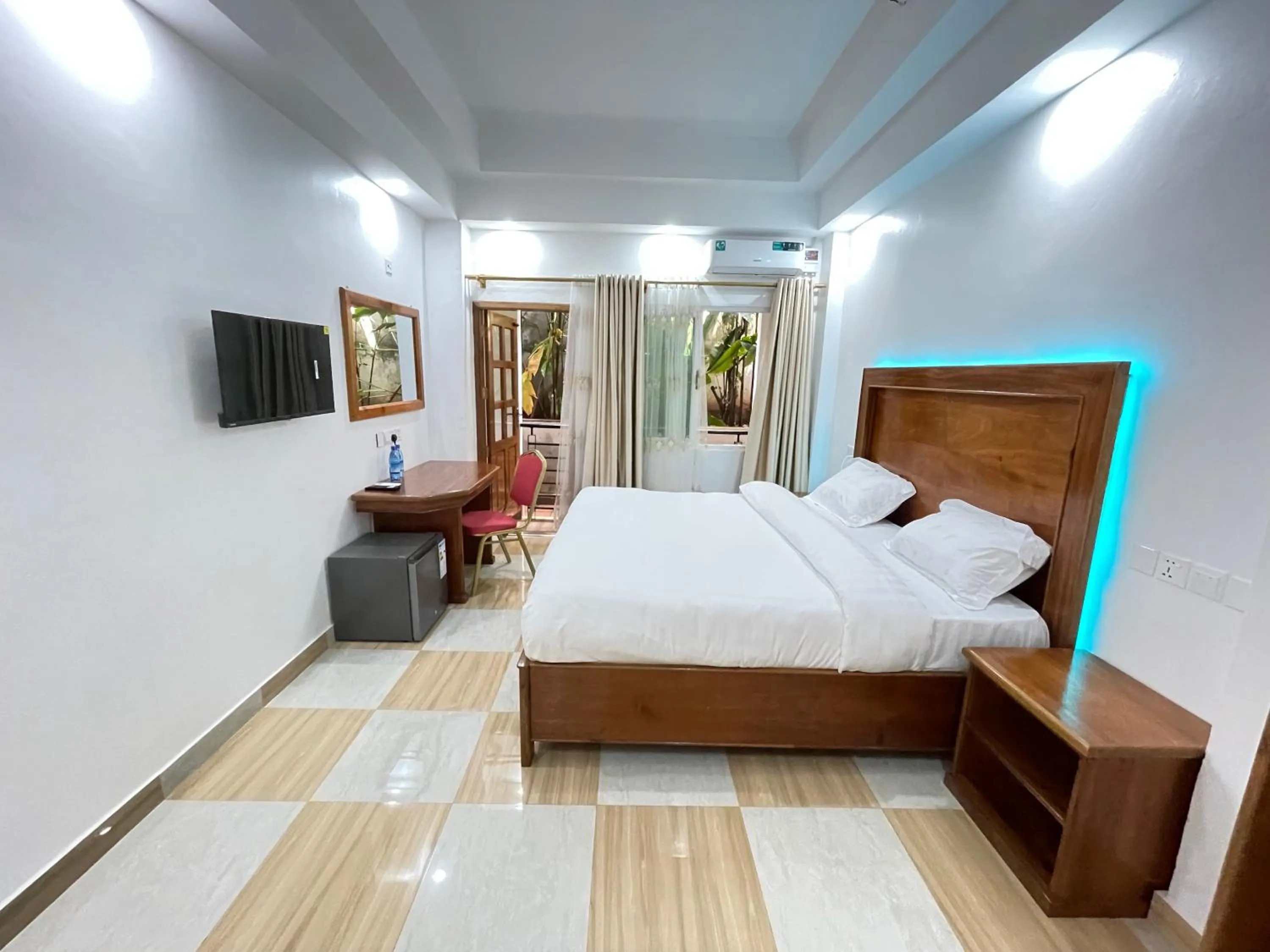 Bed in Pulickal Heights Hotel