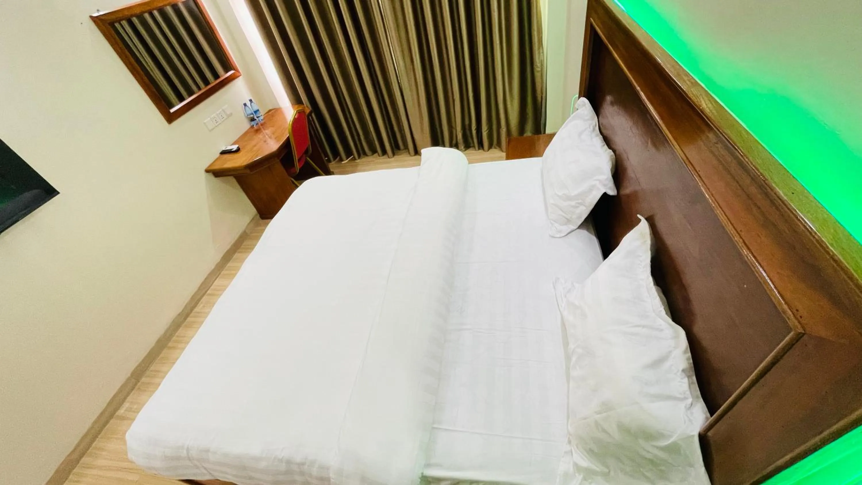 Bed in Pulickal Heights Hotel