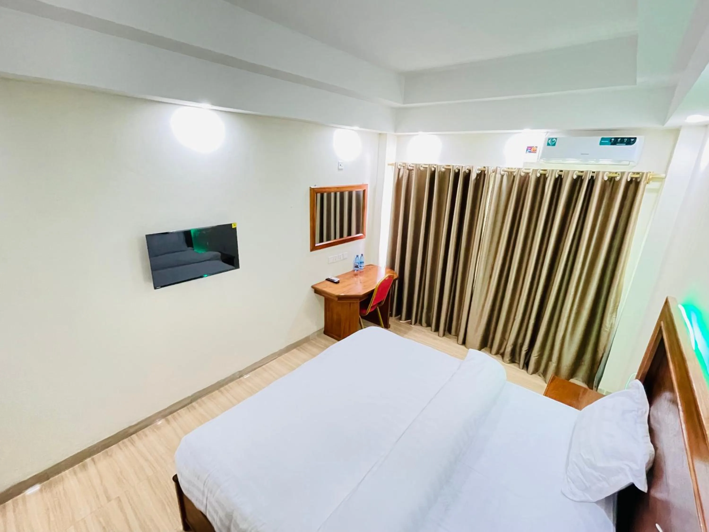 Bedroom in Pulickal Heights Hotel
