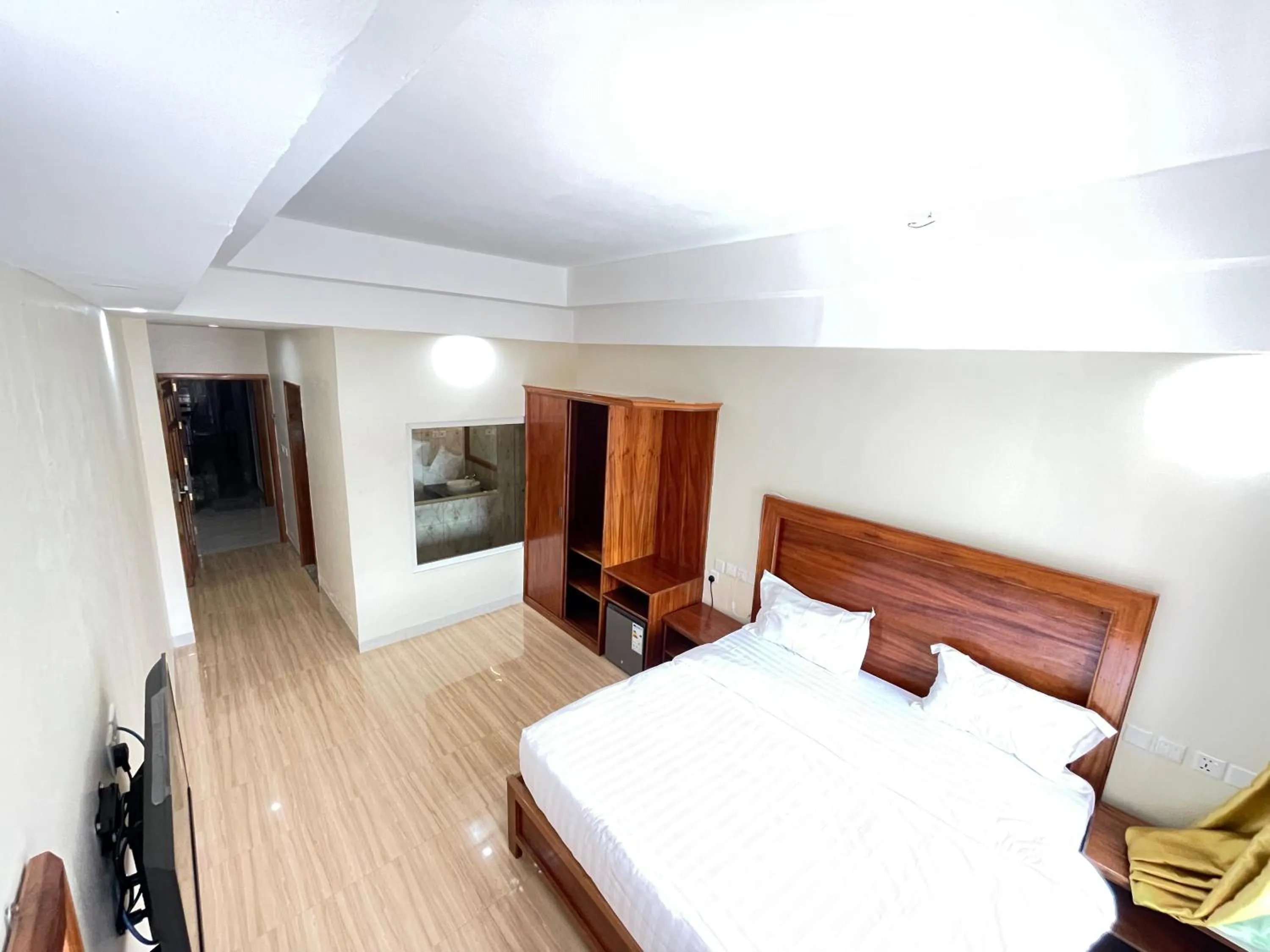 Bed in Pulickal Heights Hotel