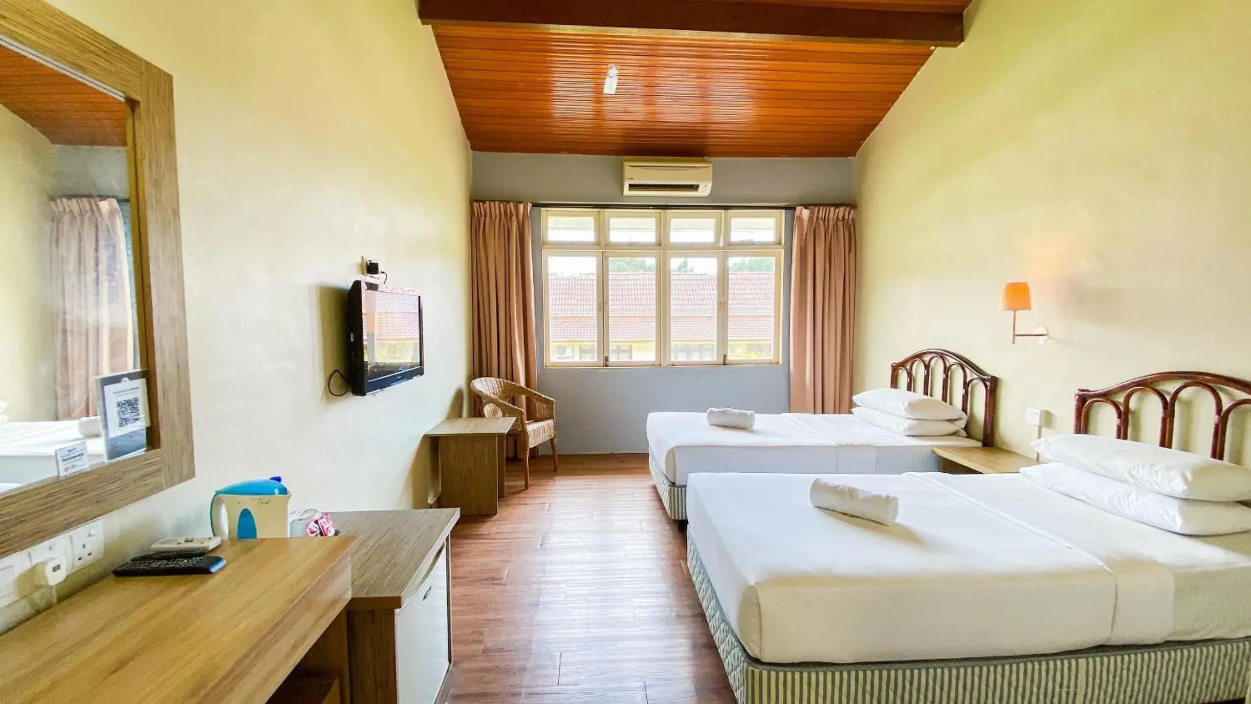 Bed in Lovita Tanjung Bidara Beach Resort Bed in Lovita Tanjung Bidara Beach Resort