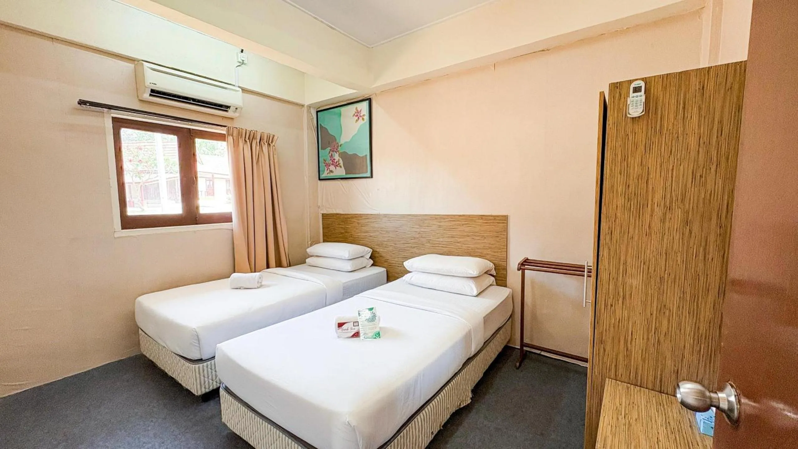 Bed in Lovita Tanjung Bidara Beach Resort