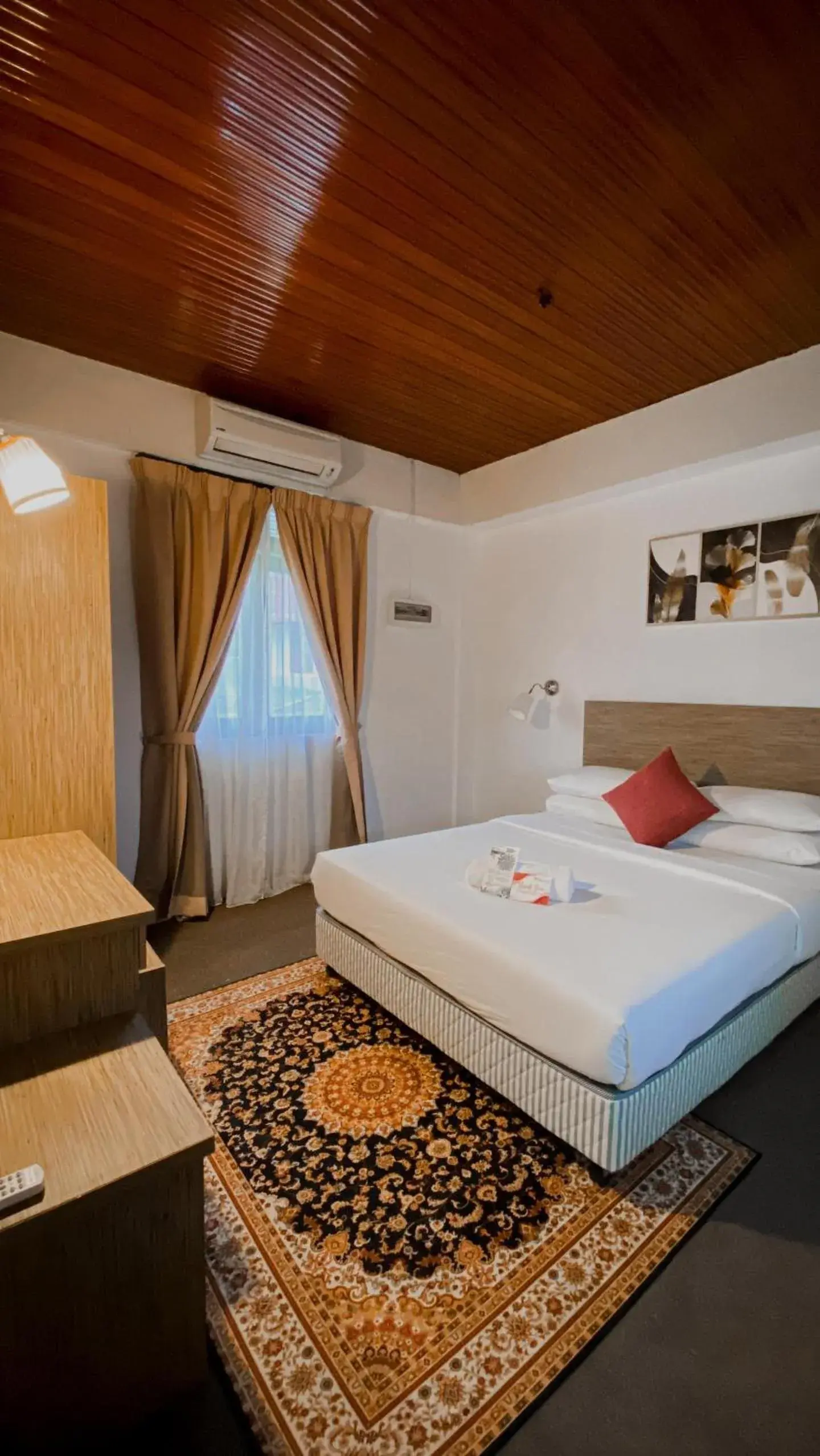 Bed in Lovita Tanjung Bidara Beach Resort Bed in Lovita Tanjung Bidara Beach Resort