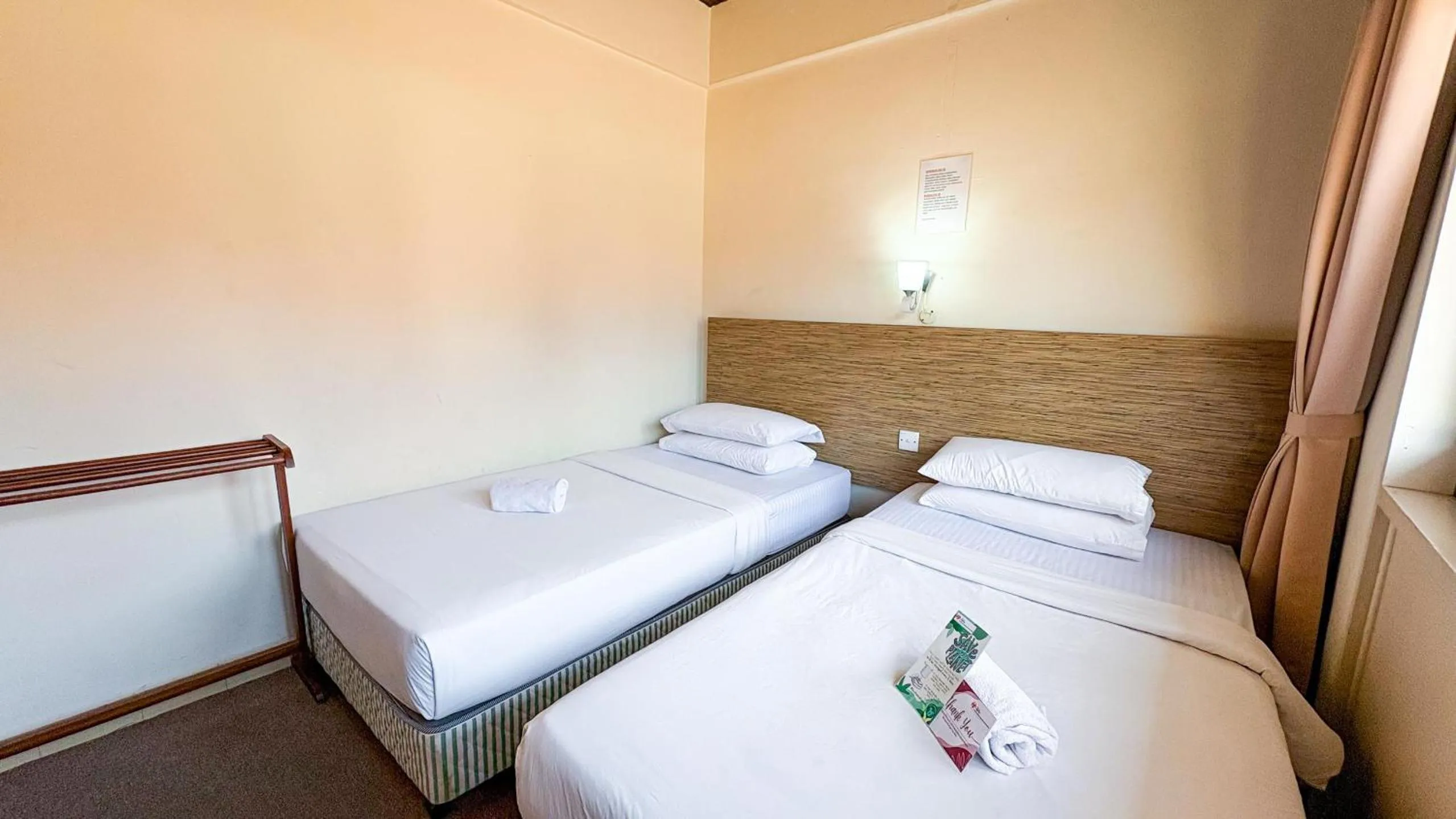 Bed in Lovita Tanjung Bidara Beach Resort