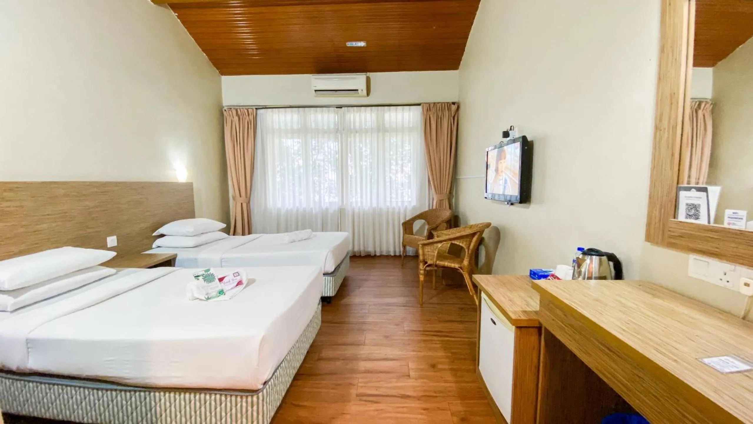 Bed in Lovita Tanjung Bidara Beach Resort