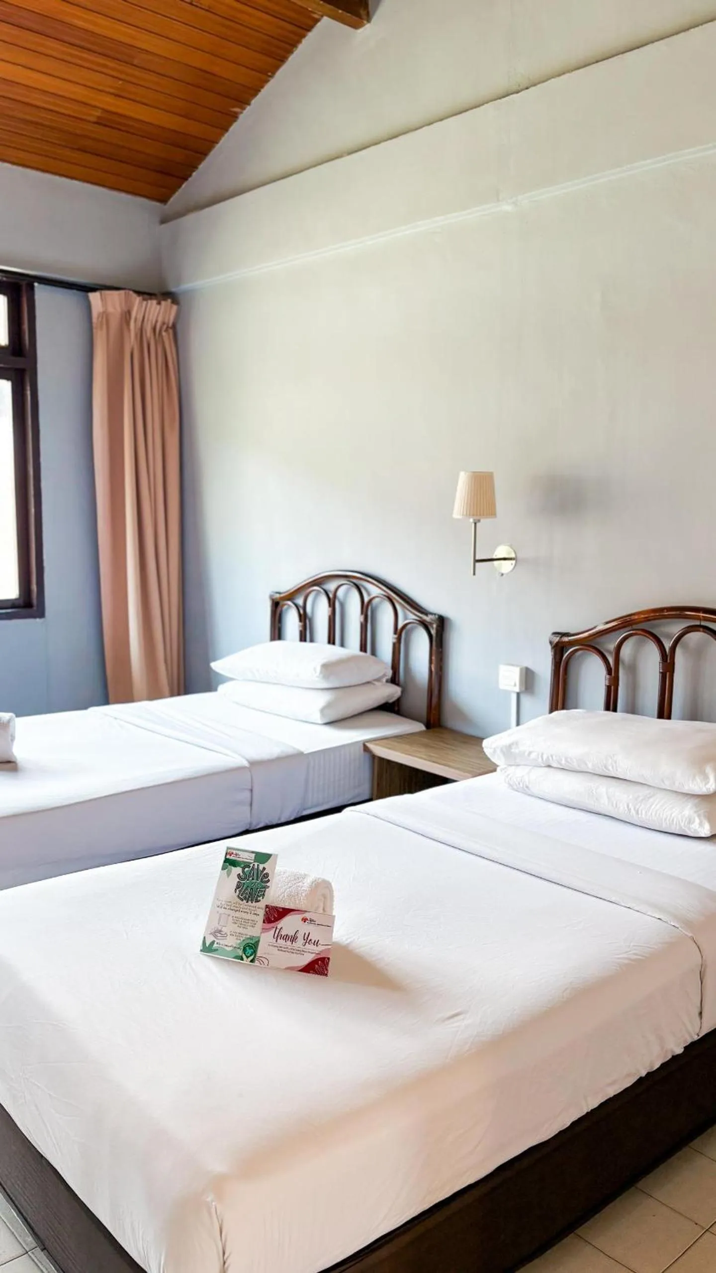 Bed in Lovita Tanjung Bidara Beach Resort