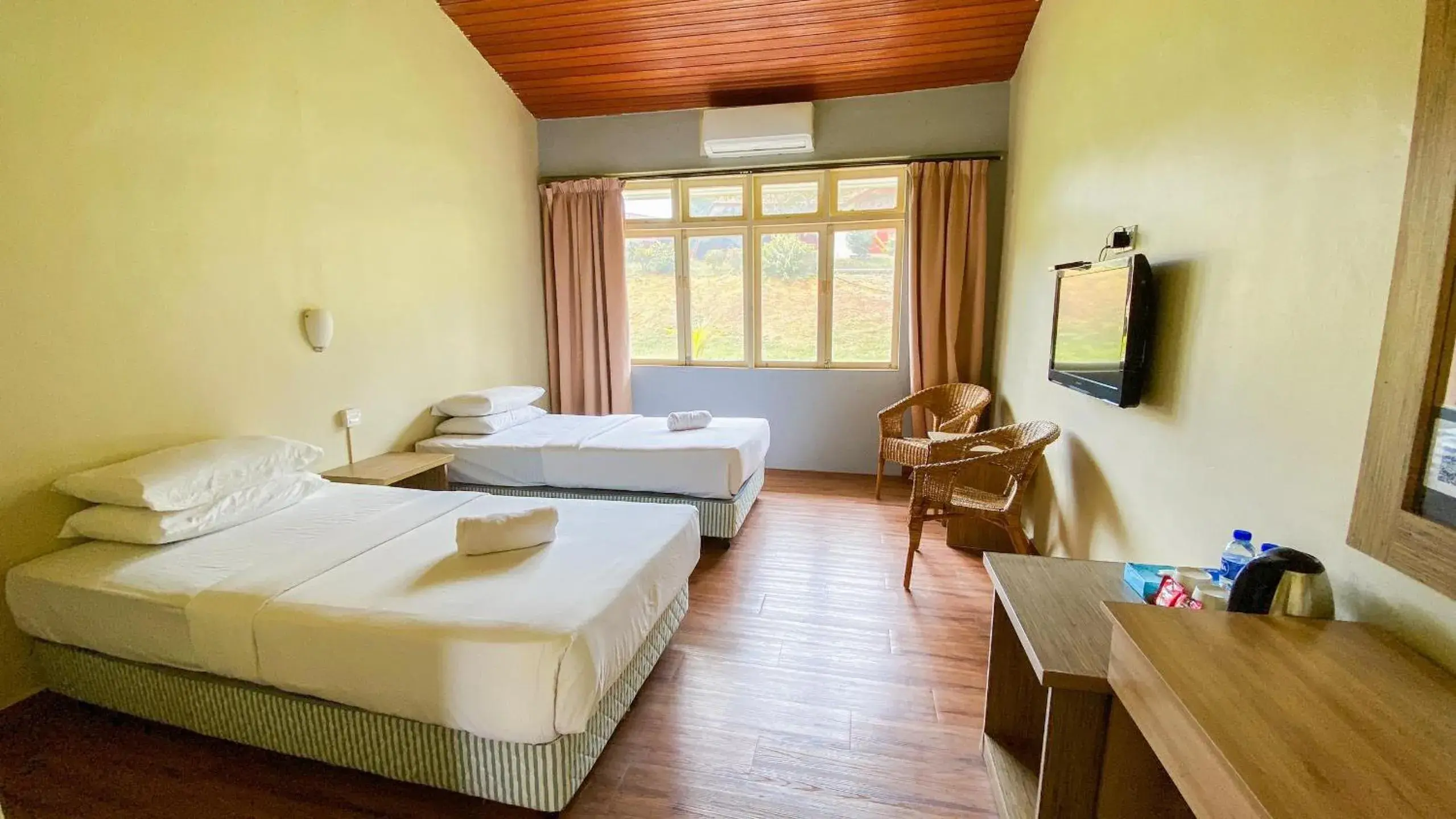 Bed in Lovita Tanjung Bidara Beach Resort Bed in Lovita Tanjung Bidara Beach Resort