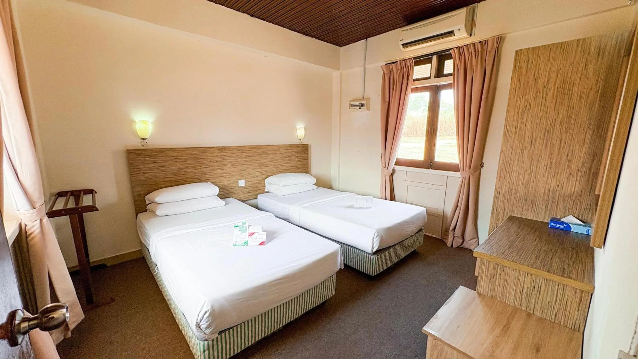 Bed in Lovita Tanjung Bidara Beach Resort