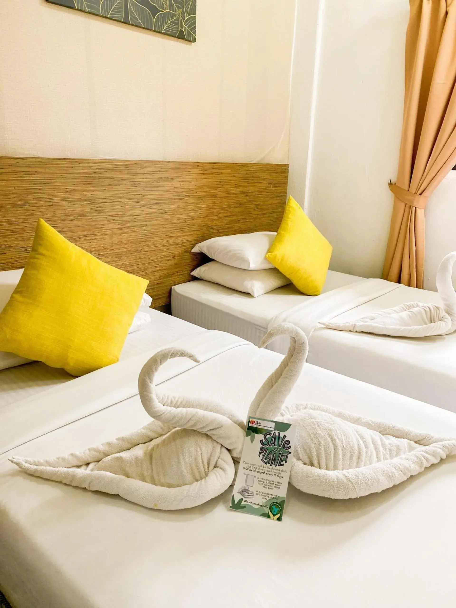 Bed in Lovita Tanjung Bidara Beach Resort Bed in Lovita Tanjung Bidara Beach Resort