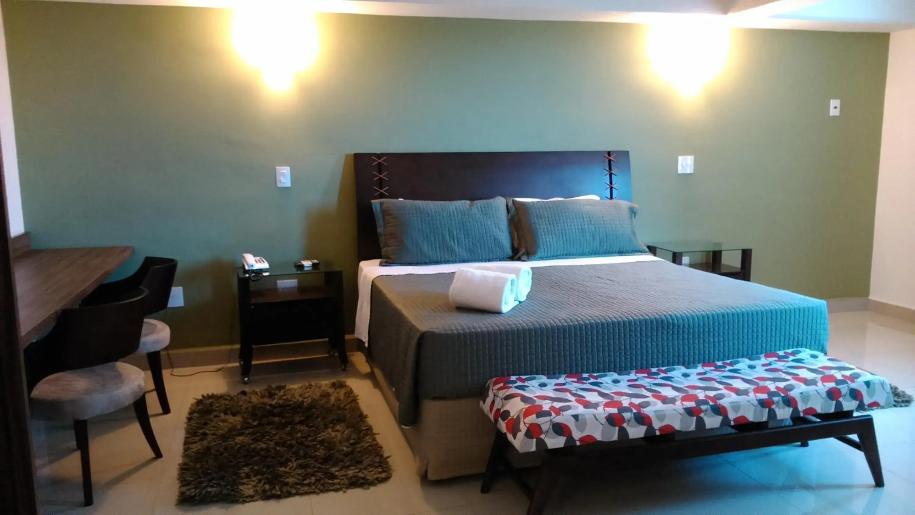 Photo of the whole room, Bed in Ipe Center Hotel Photo of the whole room, Bed in Ipe Center Hotel