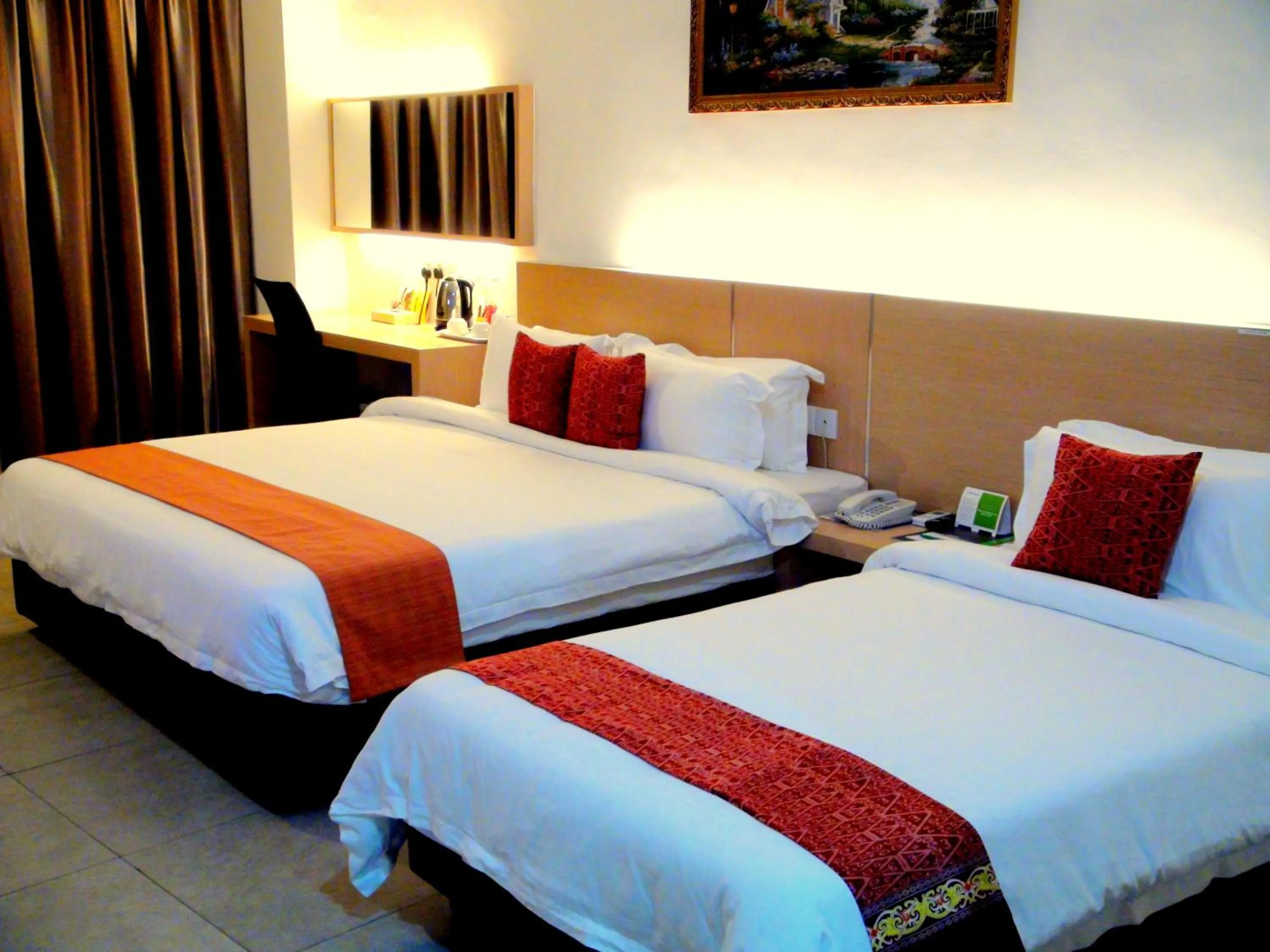Bed in Paragon Lutong Hotel