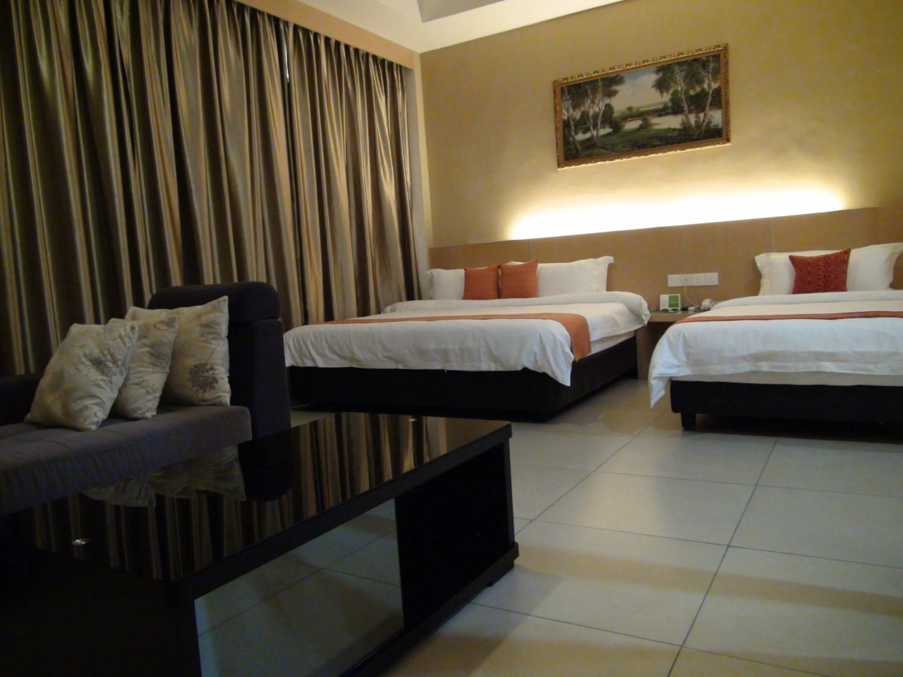 Bed in Paragon Lutong Hotel