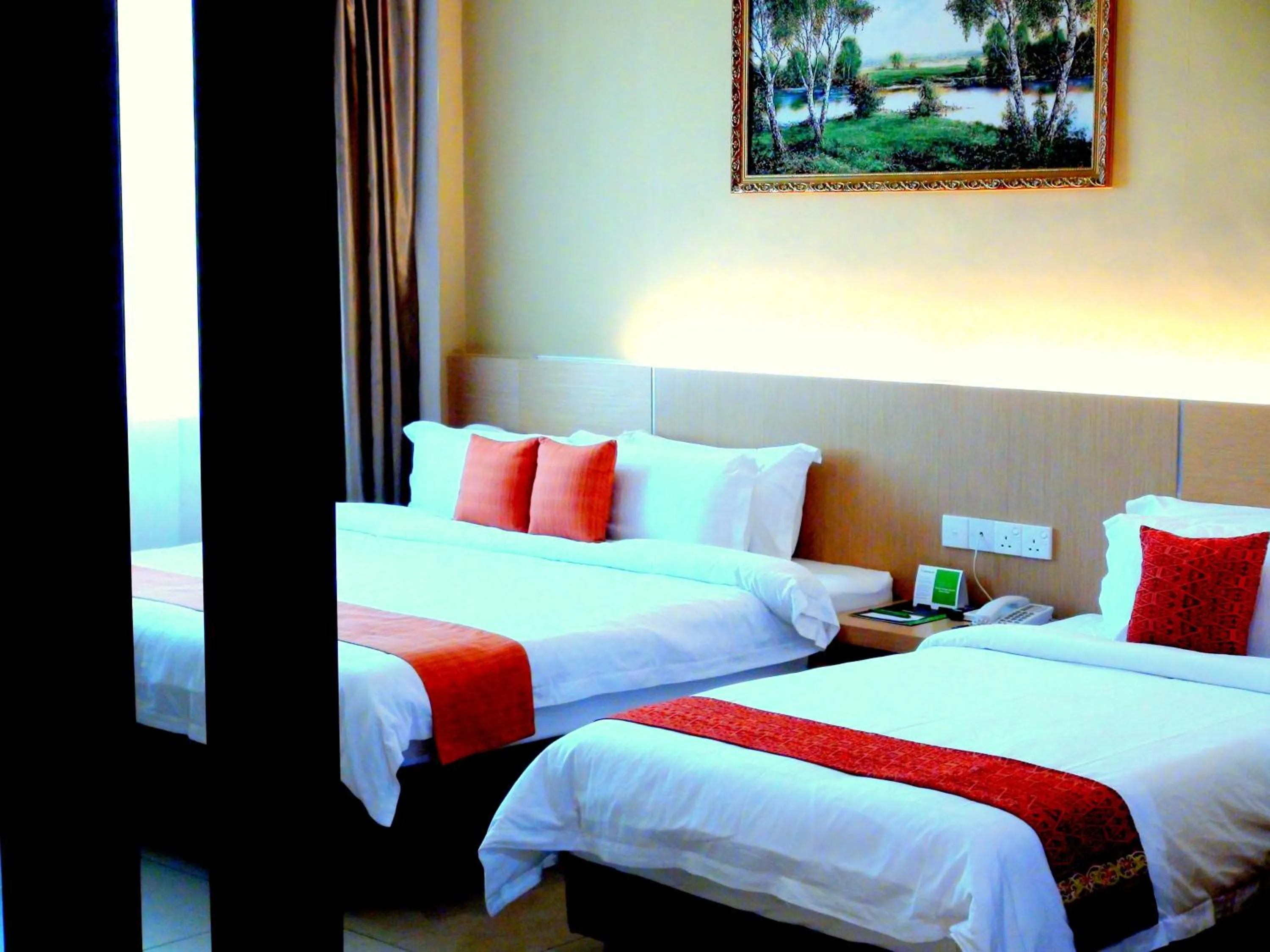 Bed in Paragon Lutong Hotel