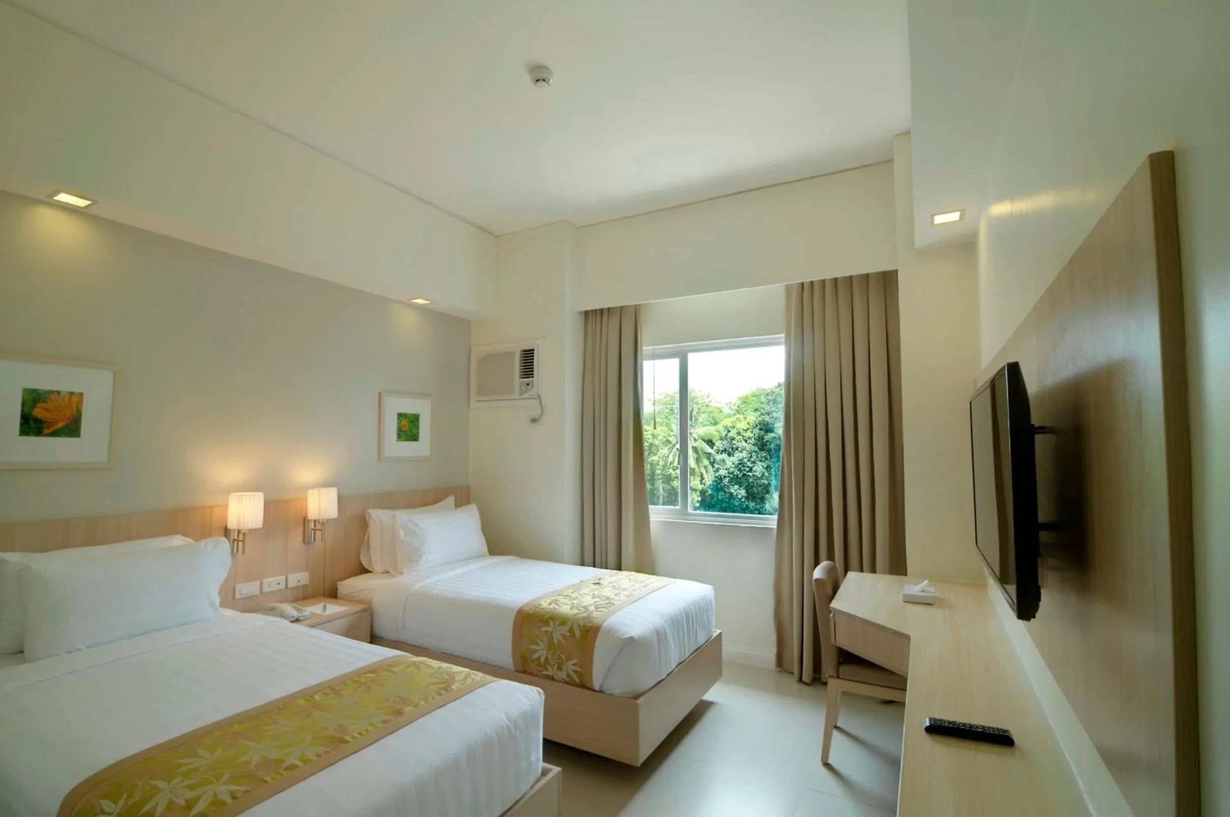 Photo of the whole room, Bed in Zerenity Hotel & Suites