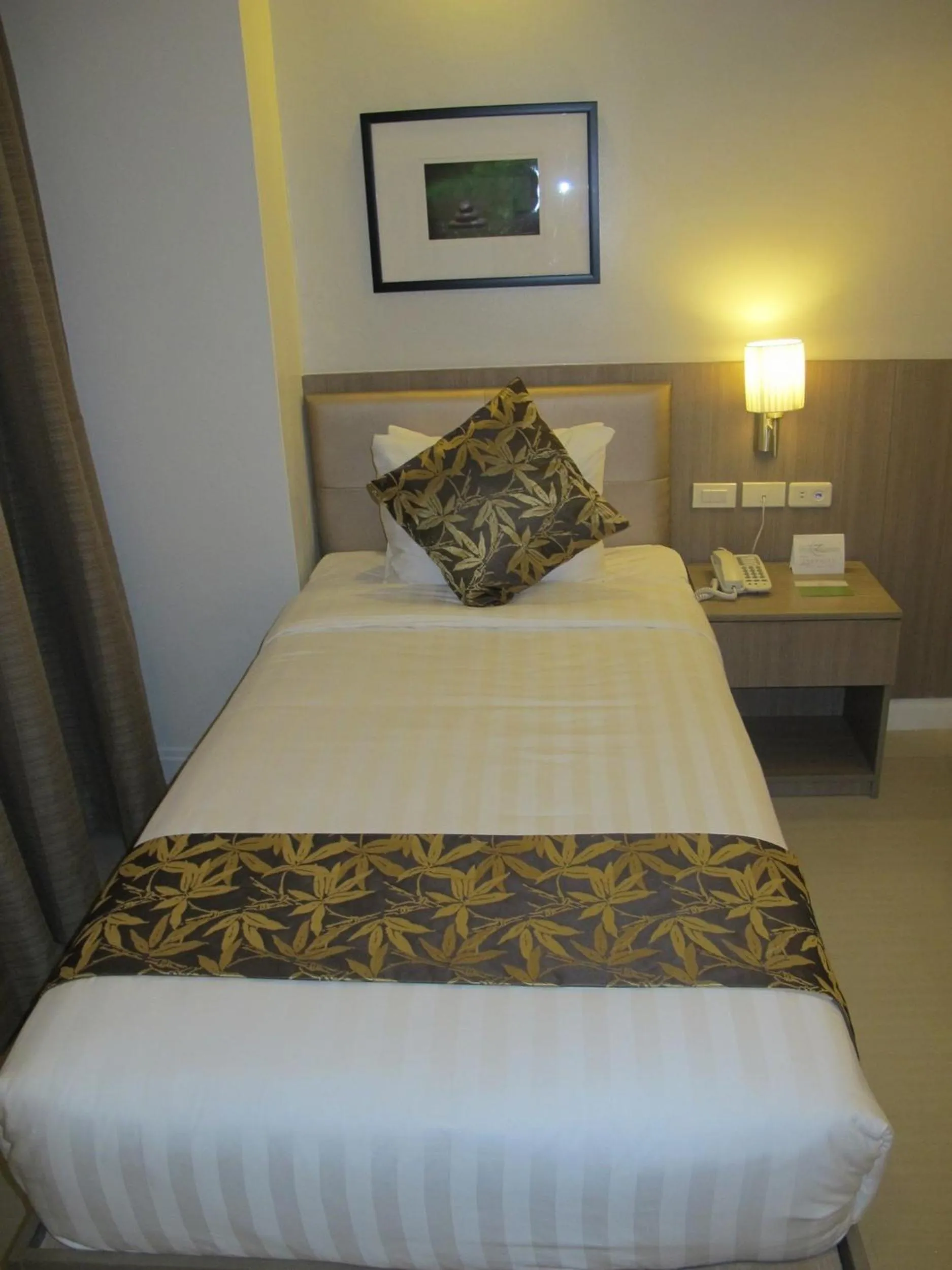Photo of the whole room, Bed in Zerenity Hotel & Suites