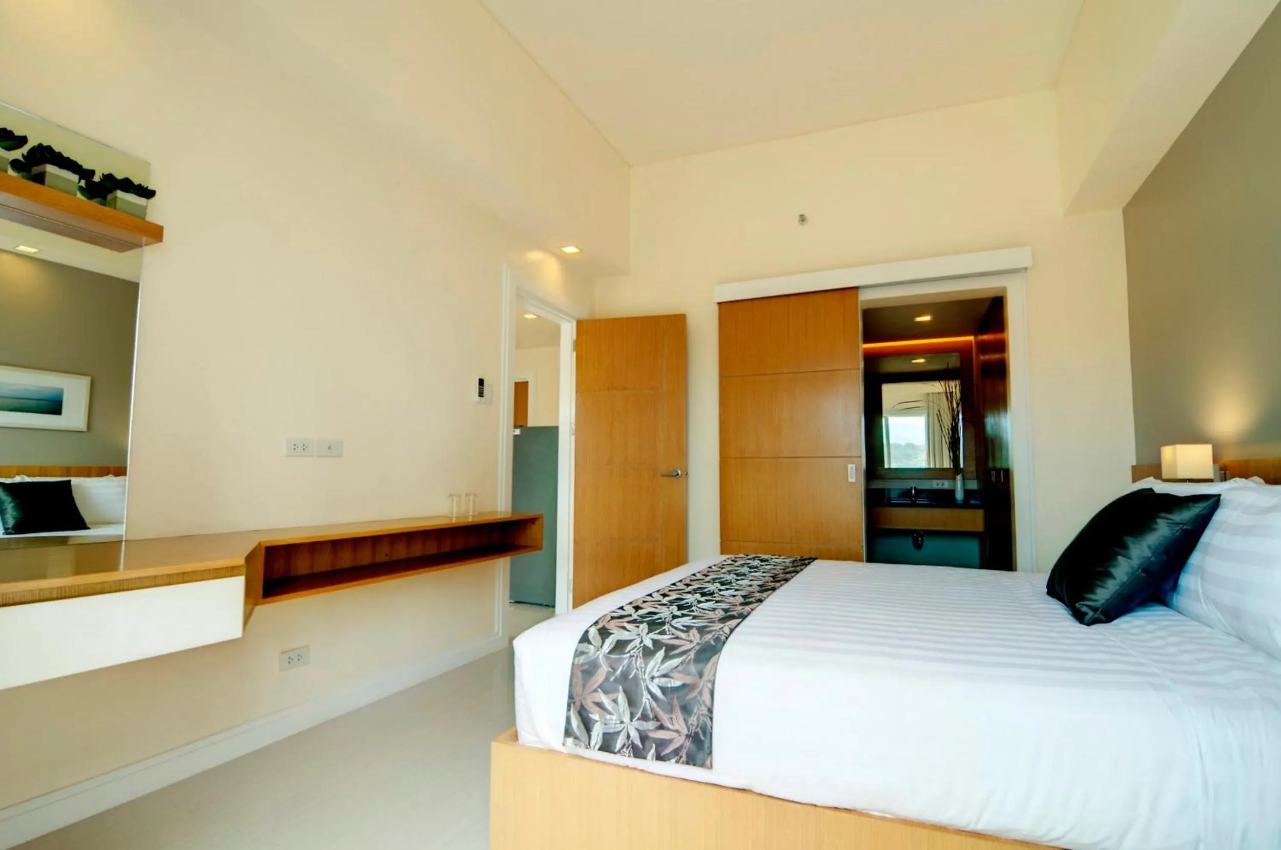 Photo of the whole room, Bed in Zerenity Hotel & Suites