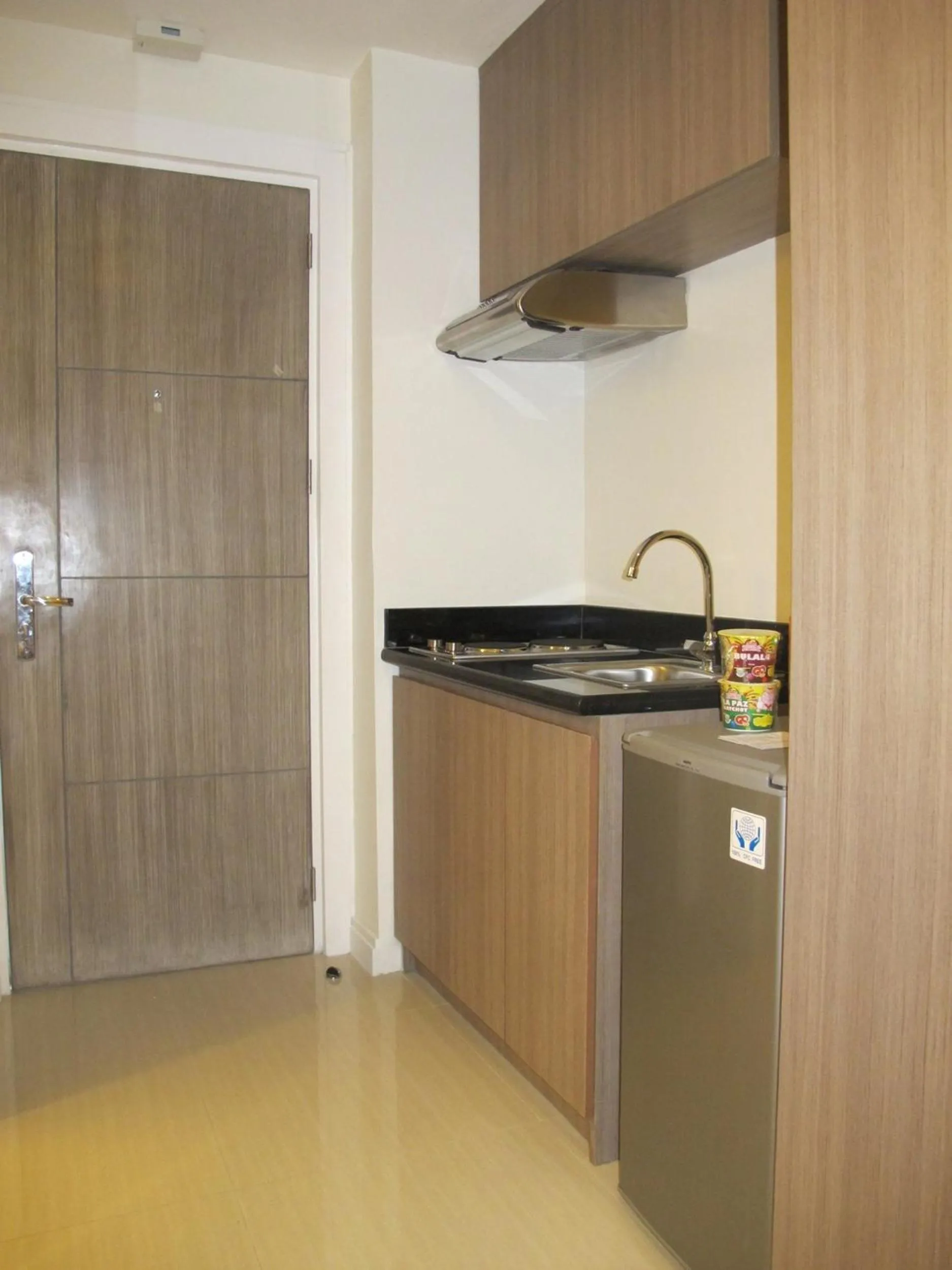 Kitchen or kitchenette in Zerenity Hotel & Suites