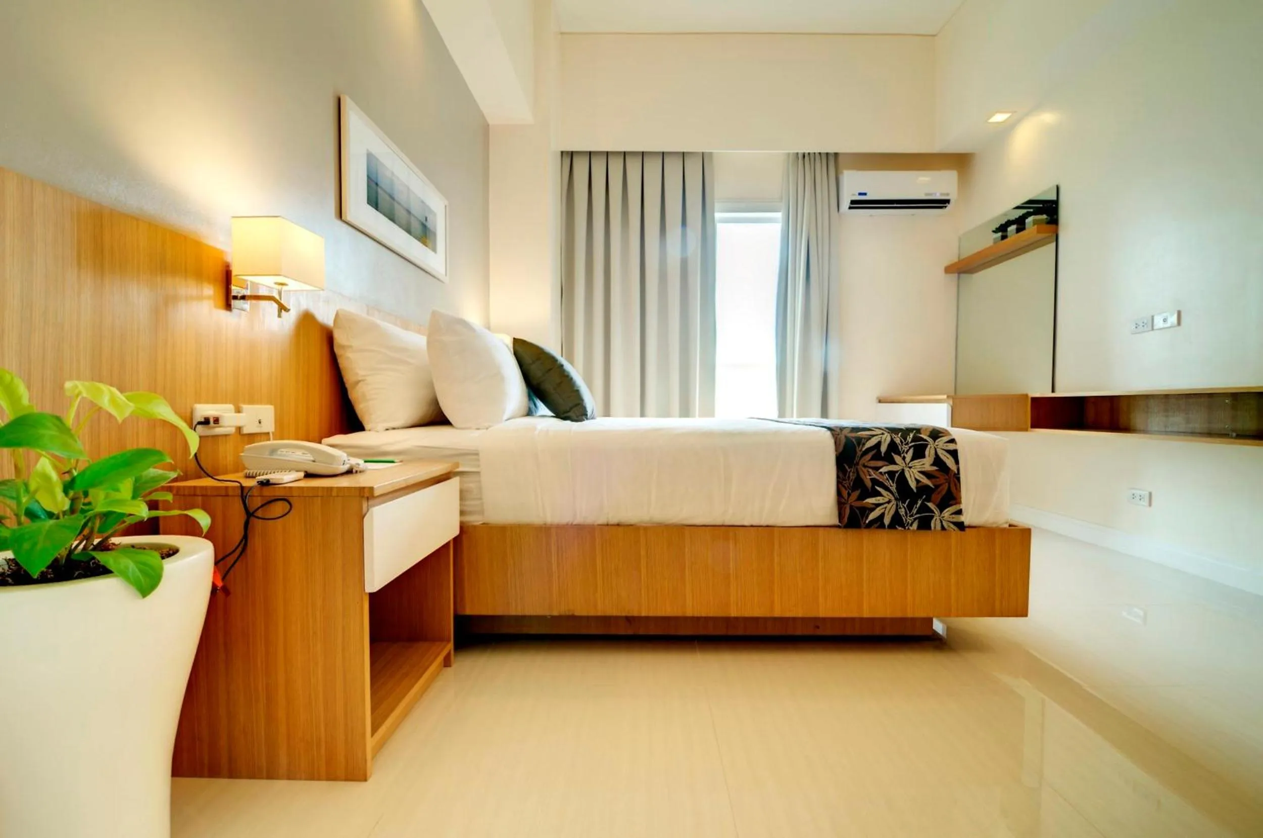 Photo of the whole room, Bed in Zerenity Hotel & Suites