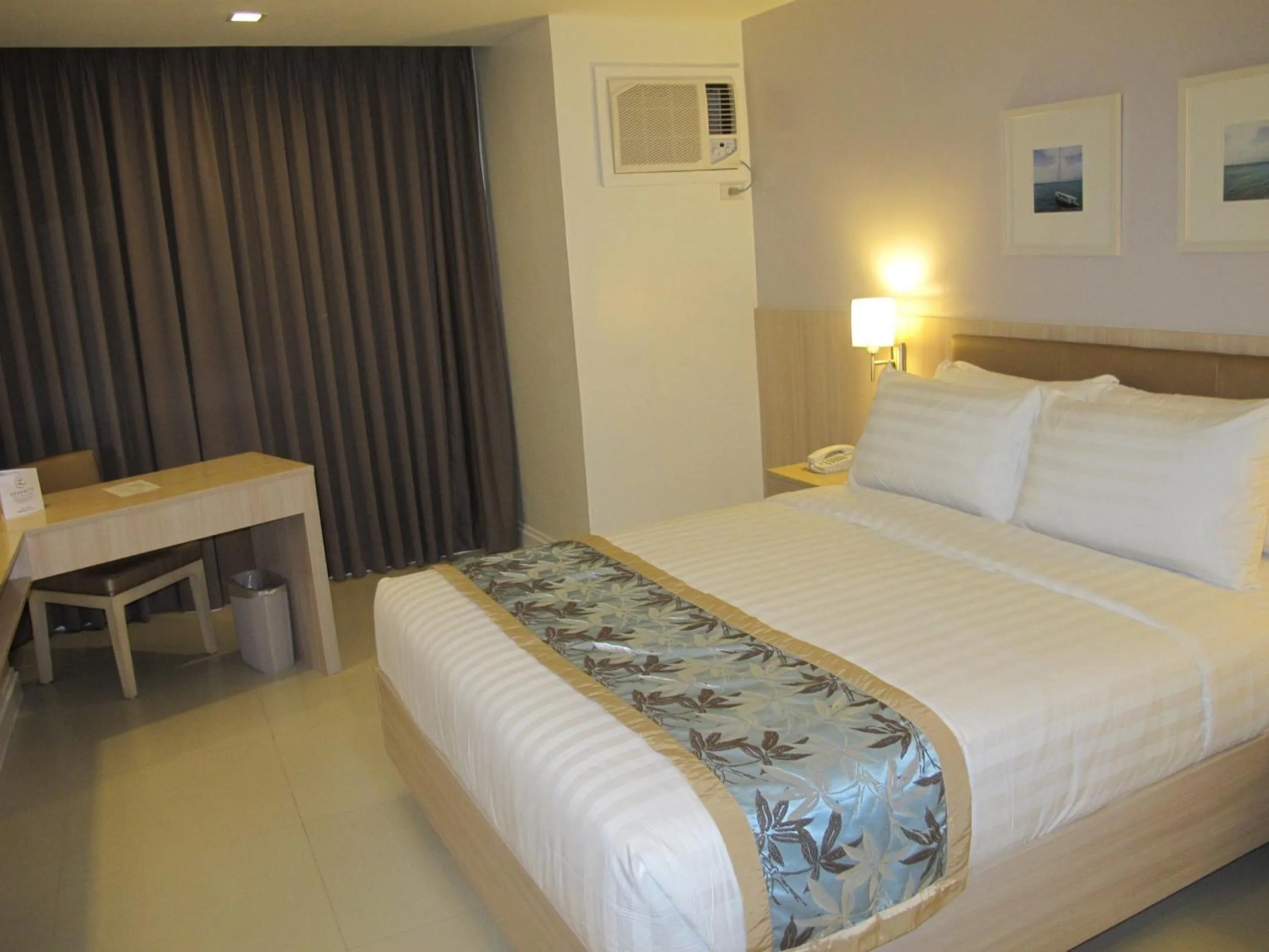Photo of the whole room, Bed in Zerenity Hotel & Suites