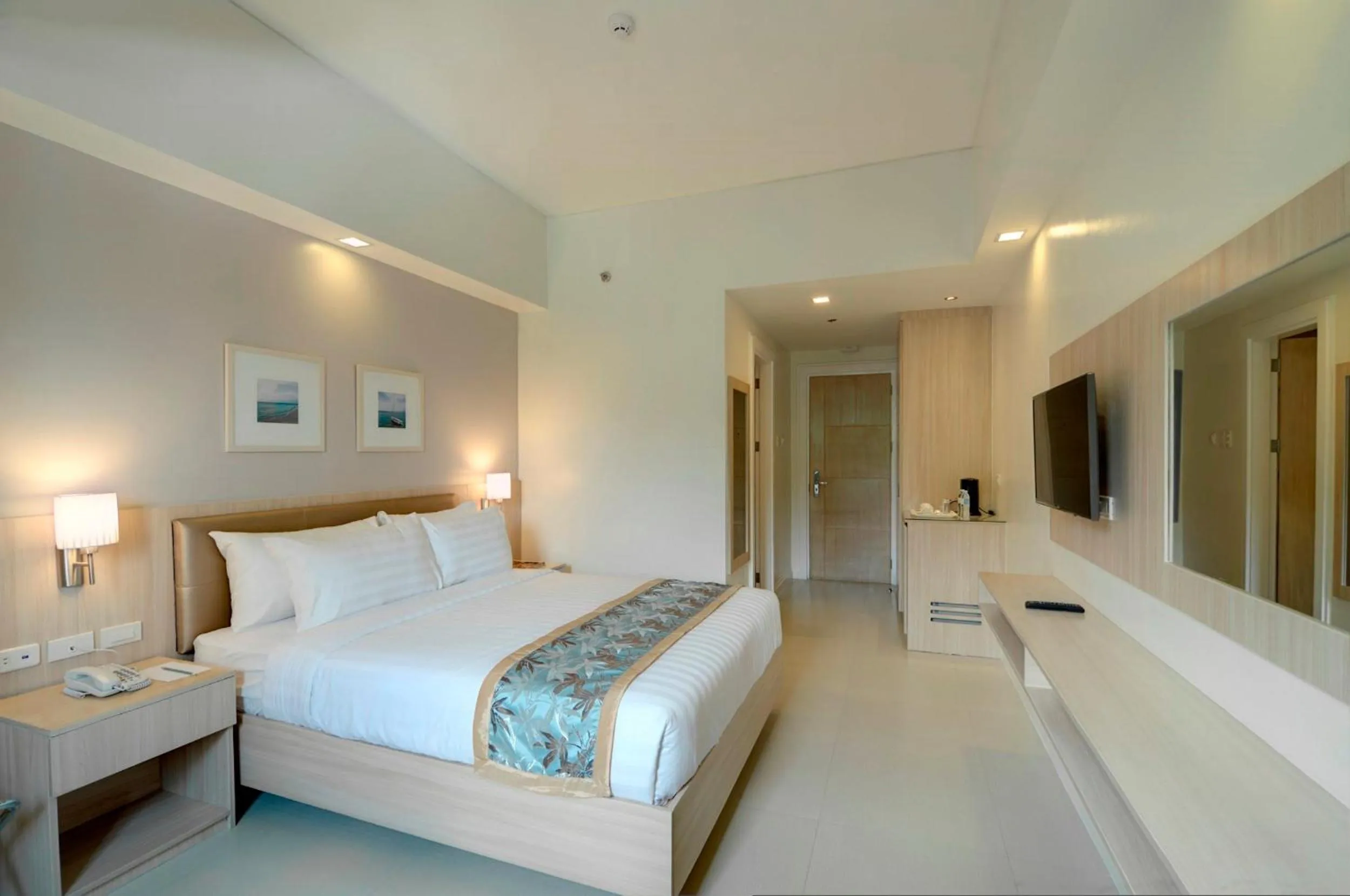 Photo of the whole room, Bed in Zerenity Hotel & Suites