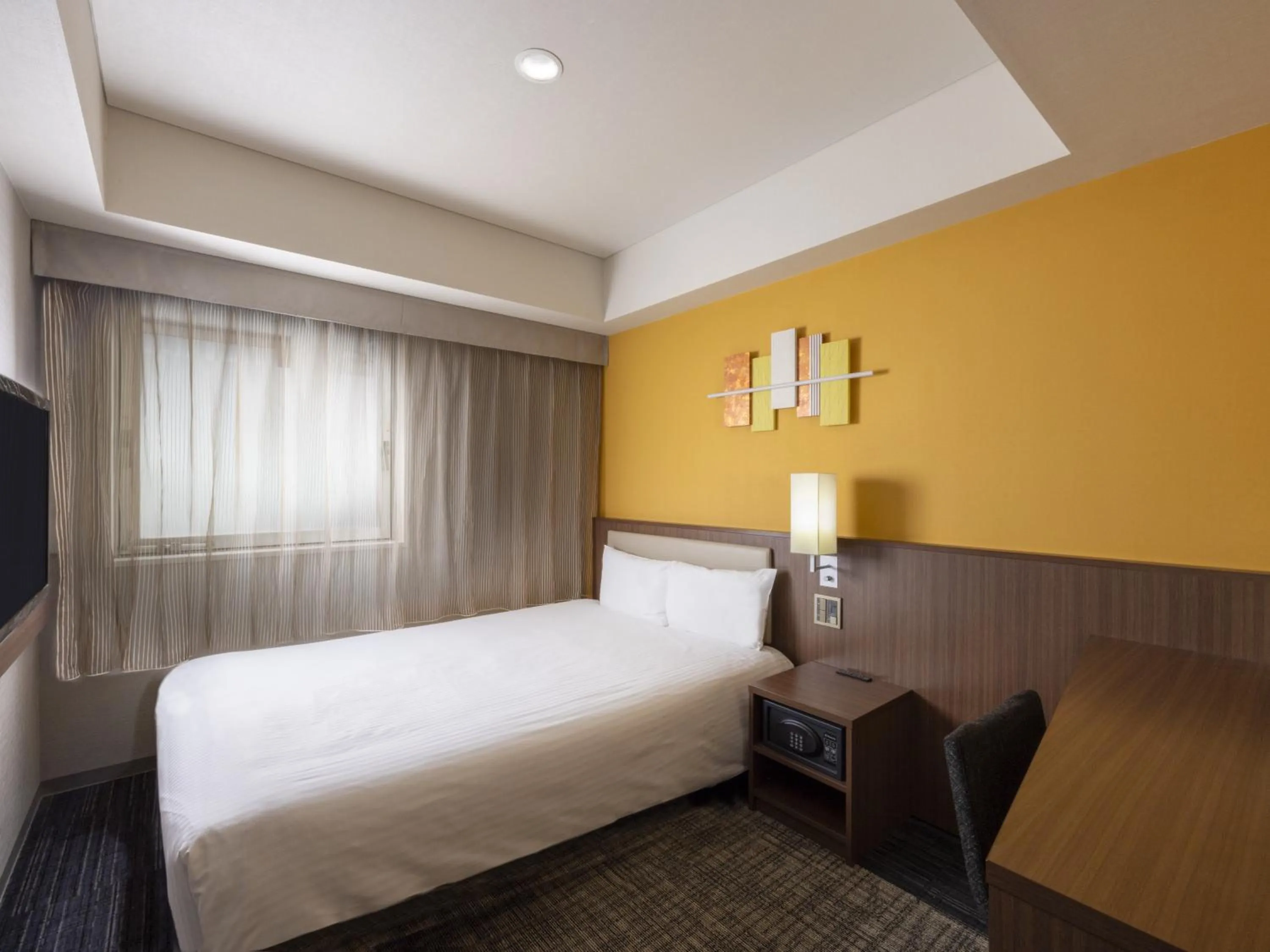 Bed in ibis Styles Kyoto Shijo