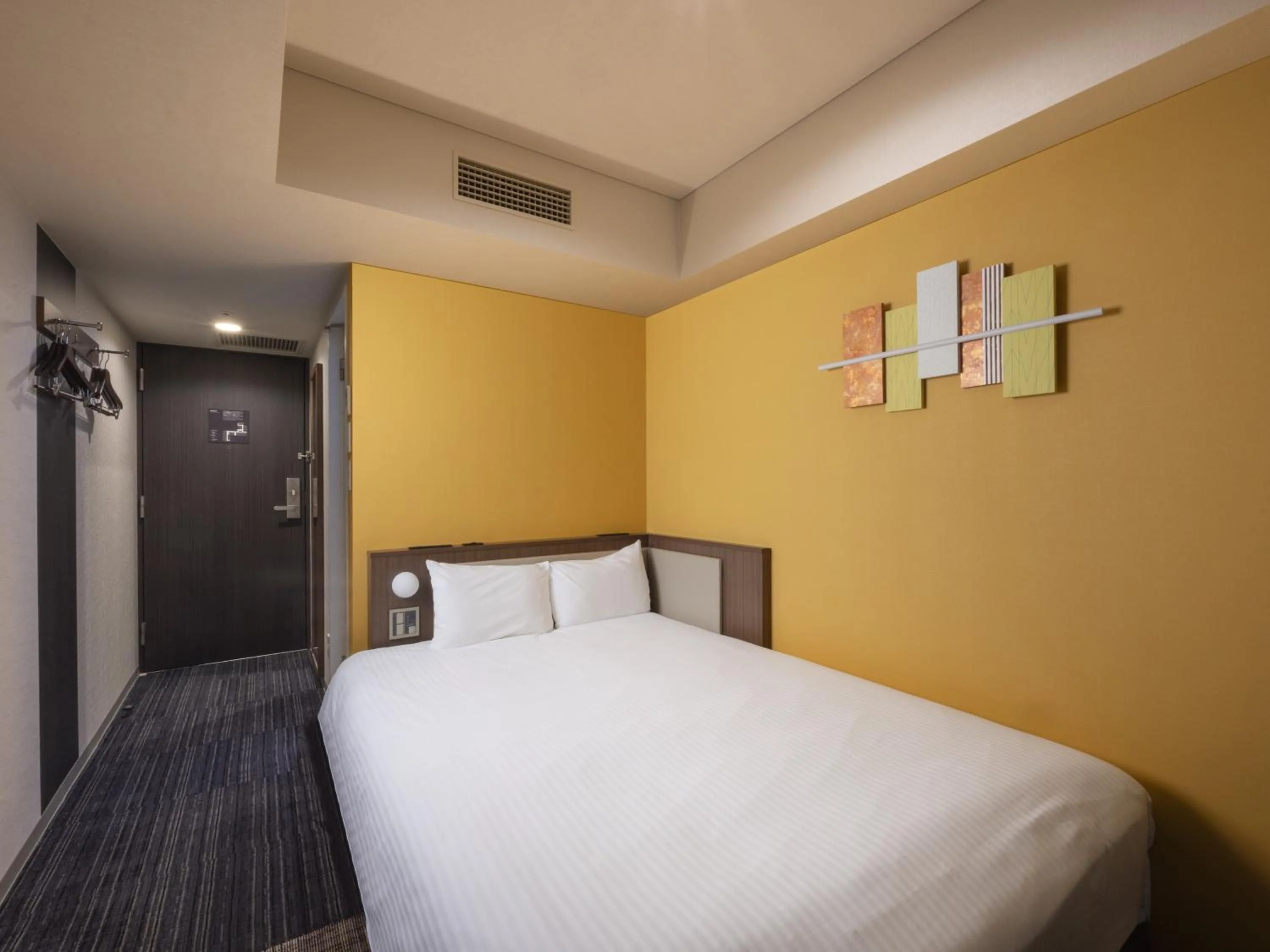 Bed in ibis Styles Kyoto Shijo