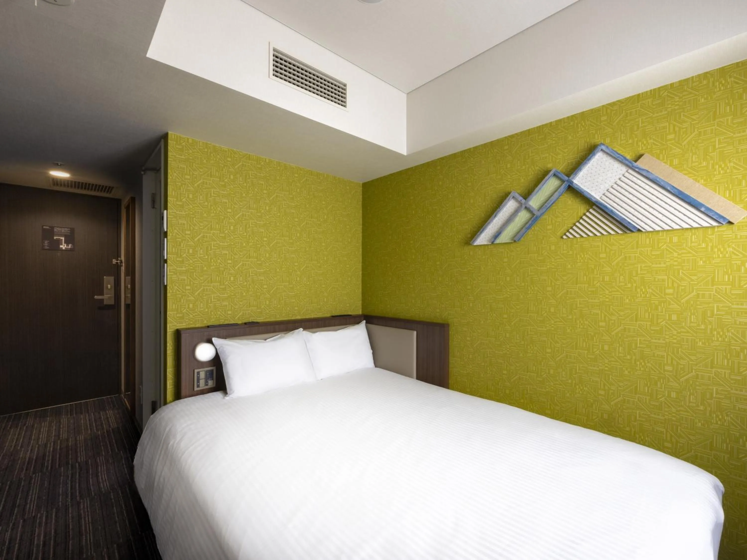 Bed in ibis Styles Kyoto Shijo