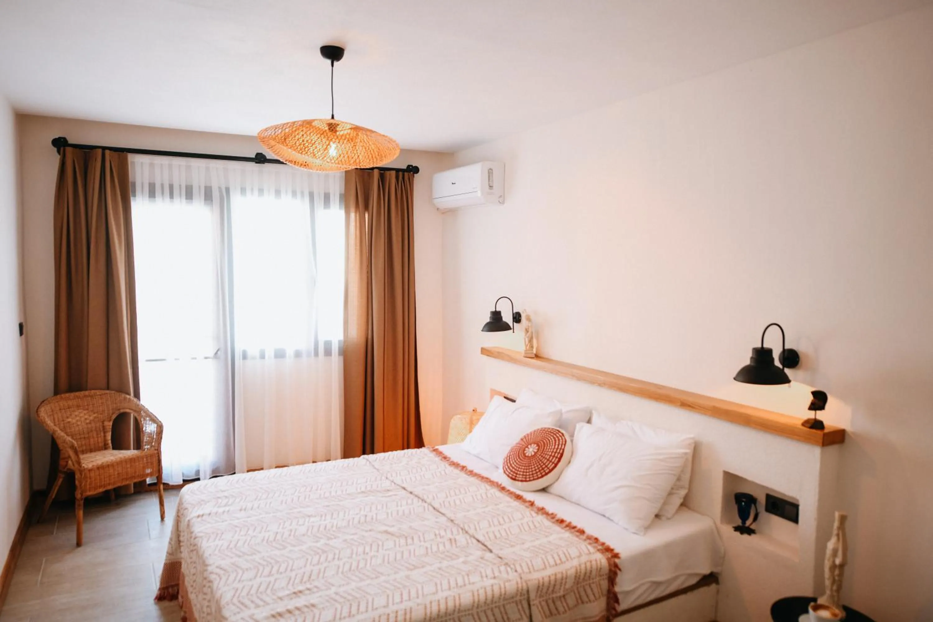 Bed in Kallinos Boutique Hotel