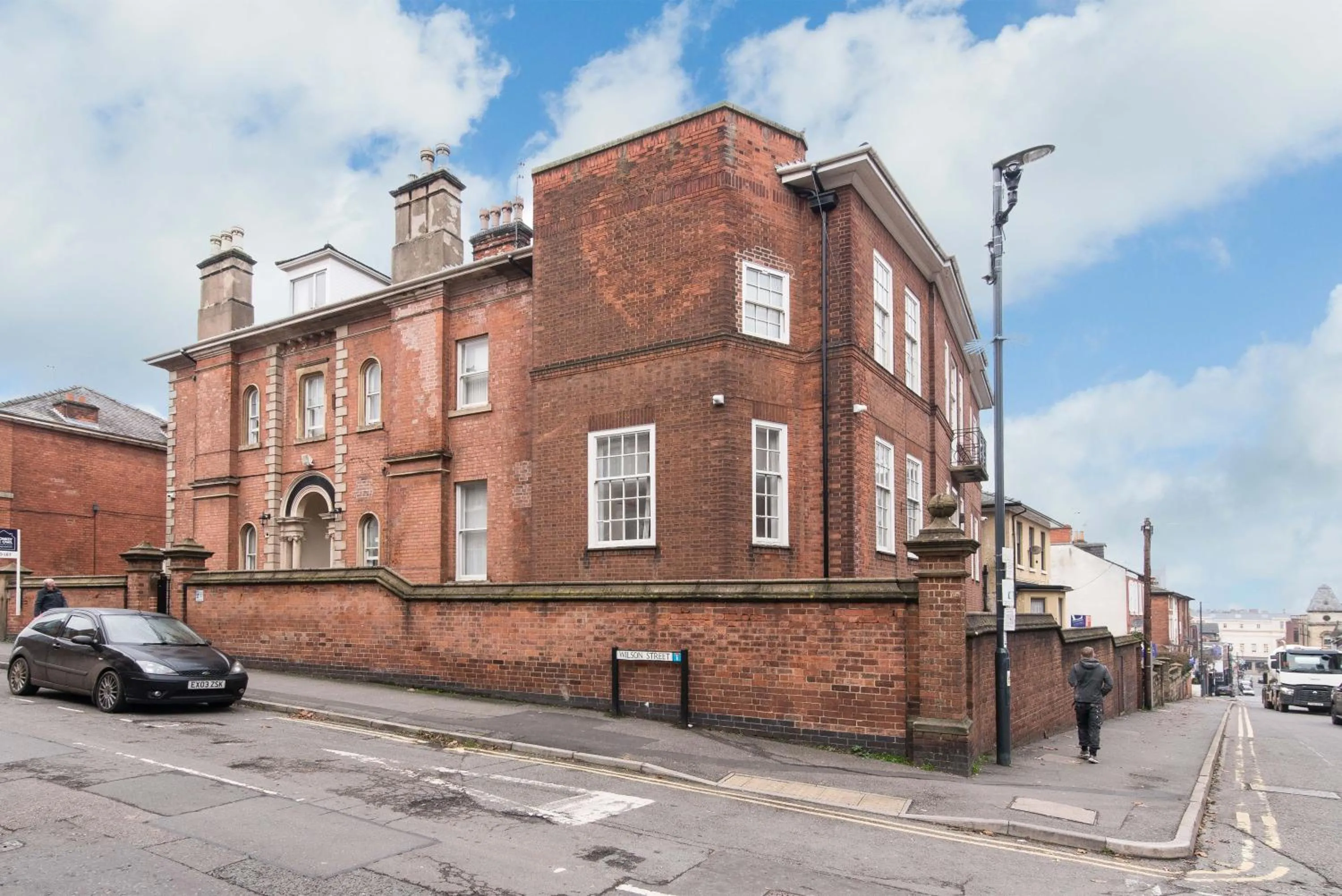 Property building in cheerful double en-suite room with free wifi