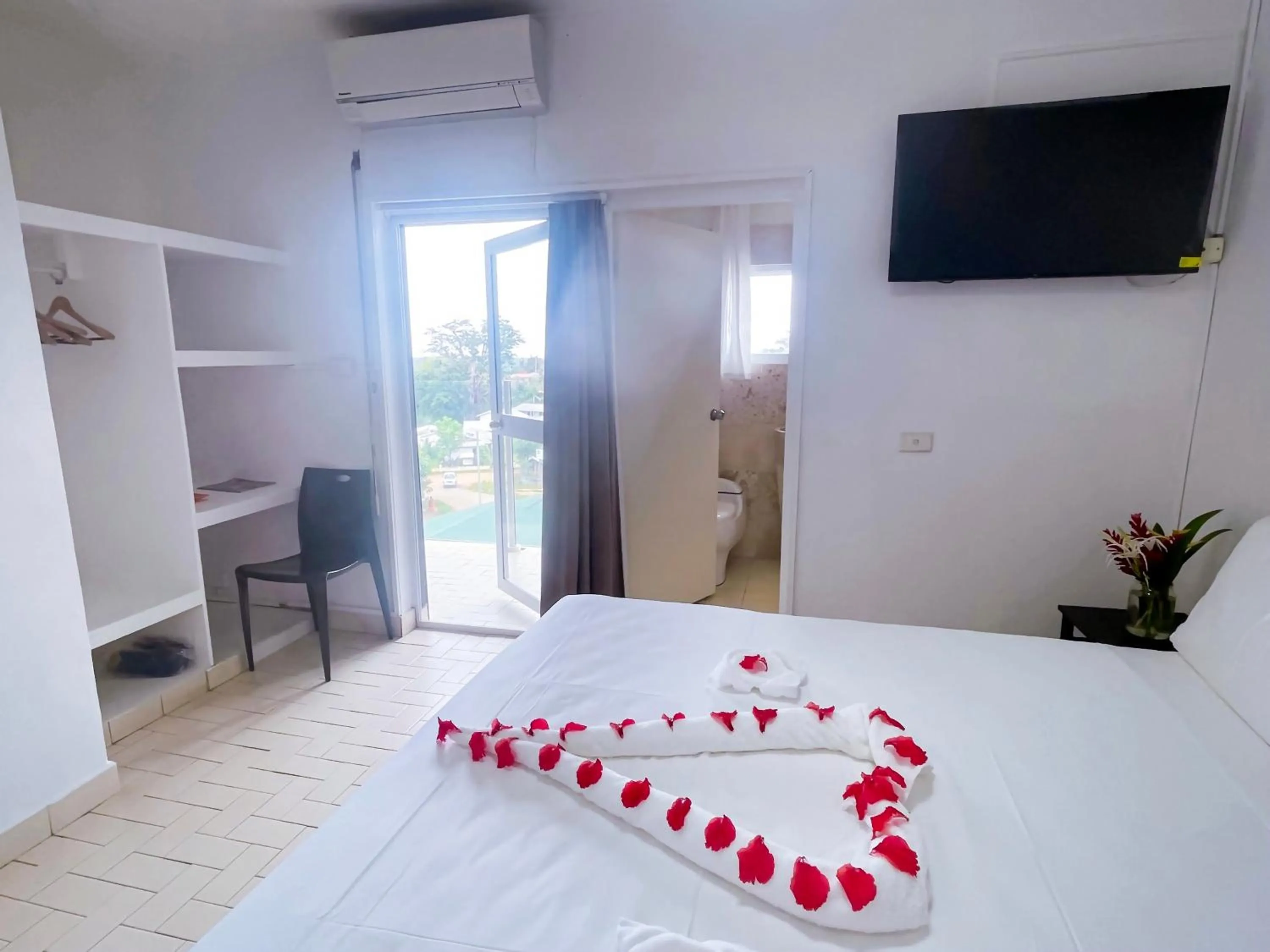 Bed in Coconut Palms Resort & Diamond Casino