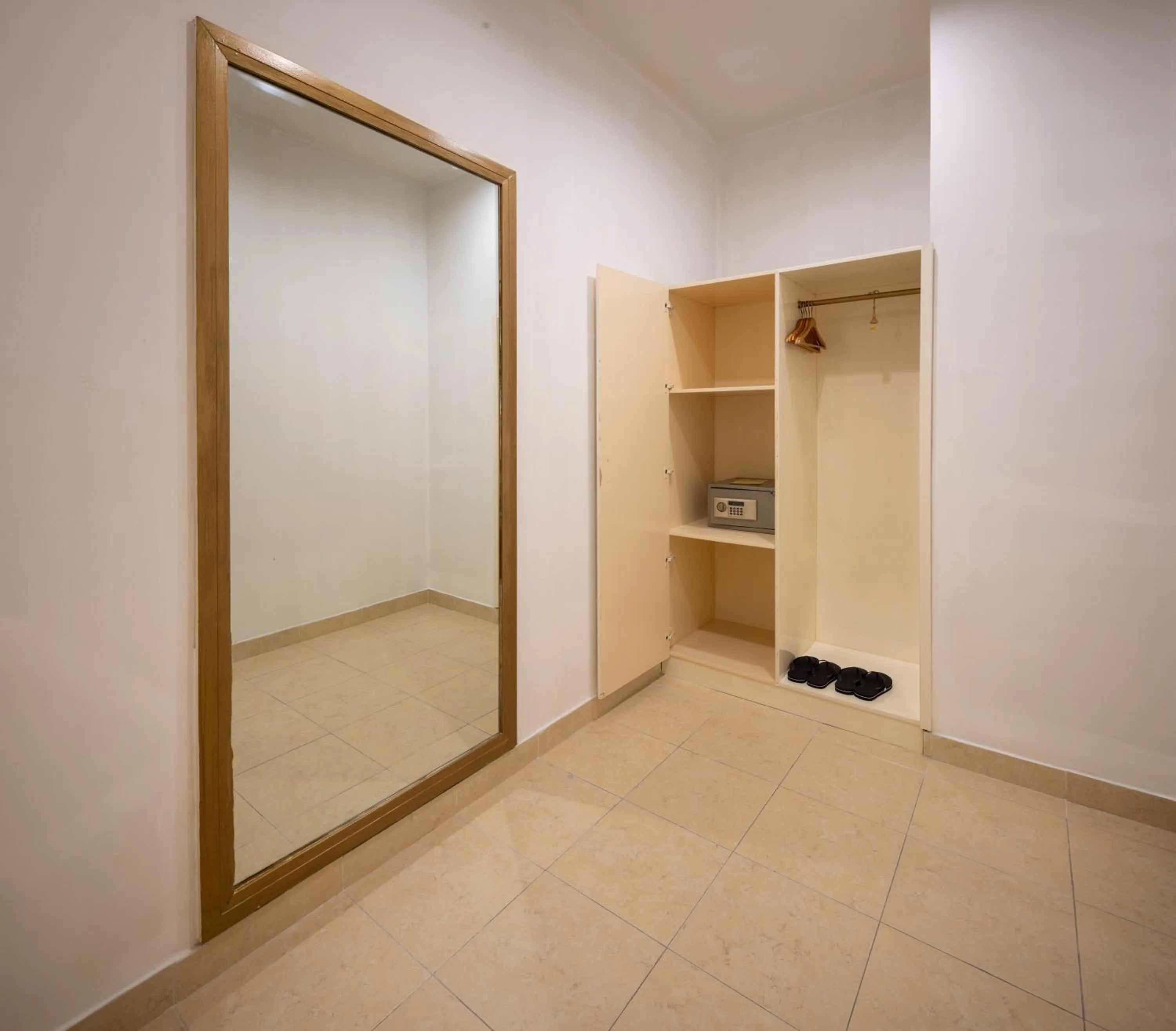 wardrobe in Hidden Mansions Saigon Resort