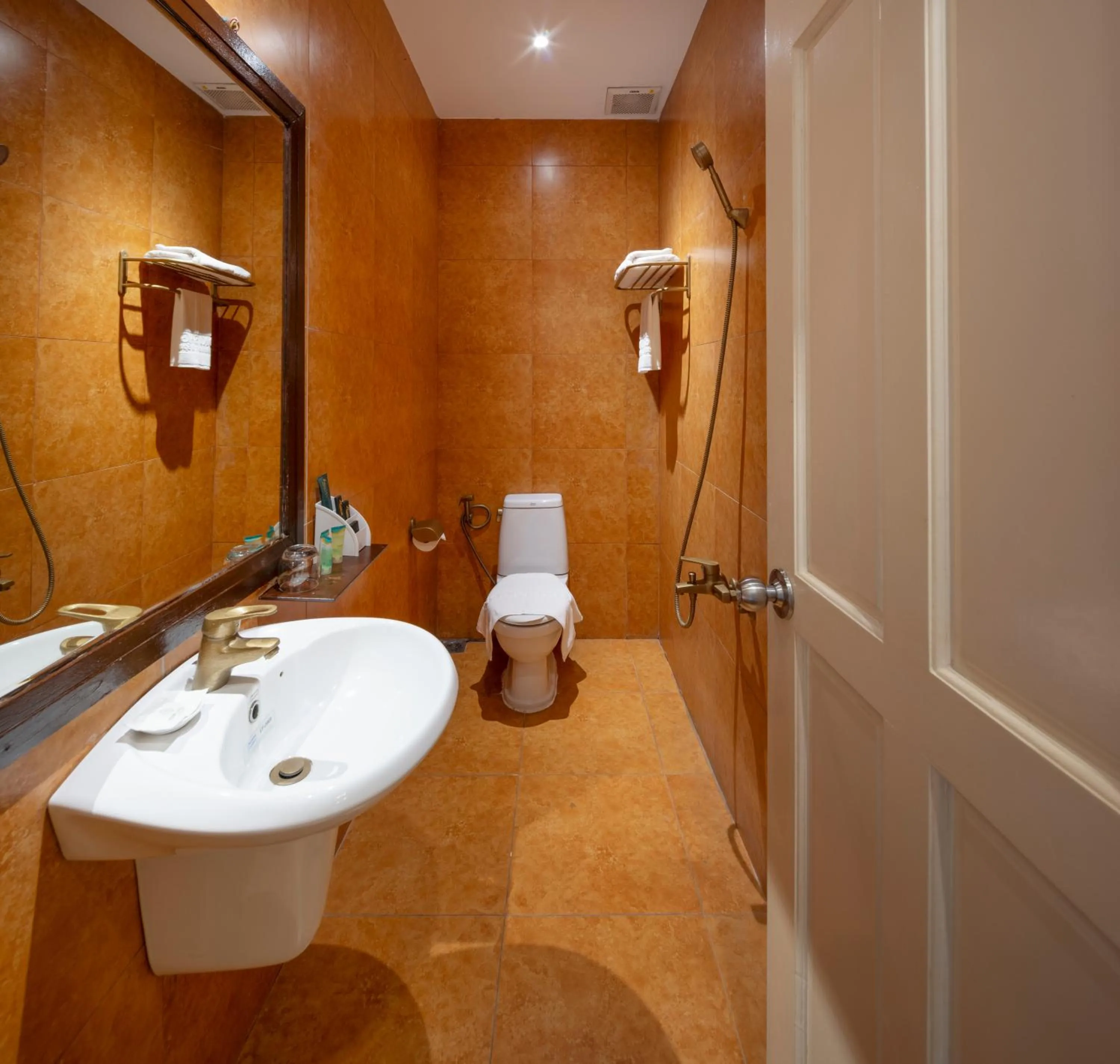 Shower in Hidden Mansions Saigon Resort