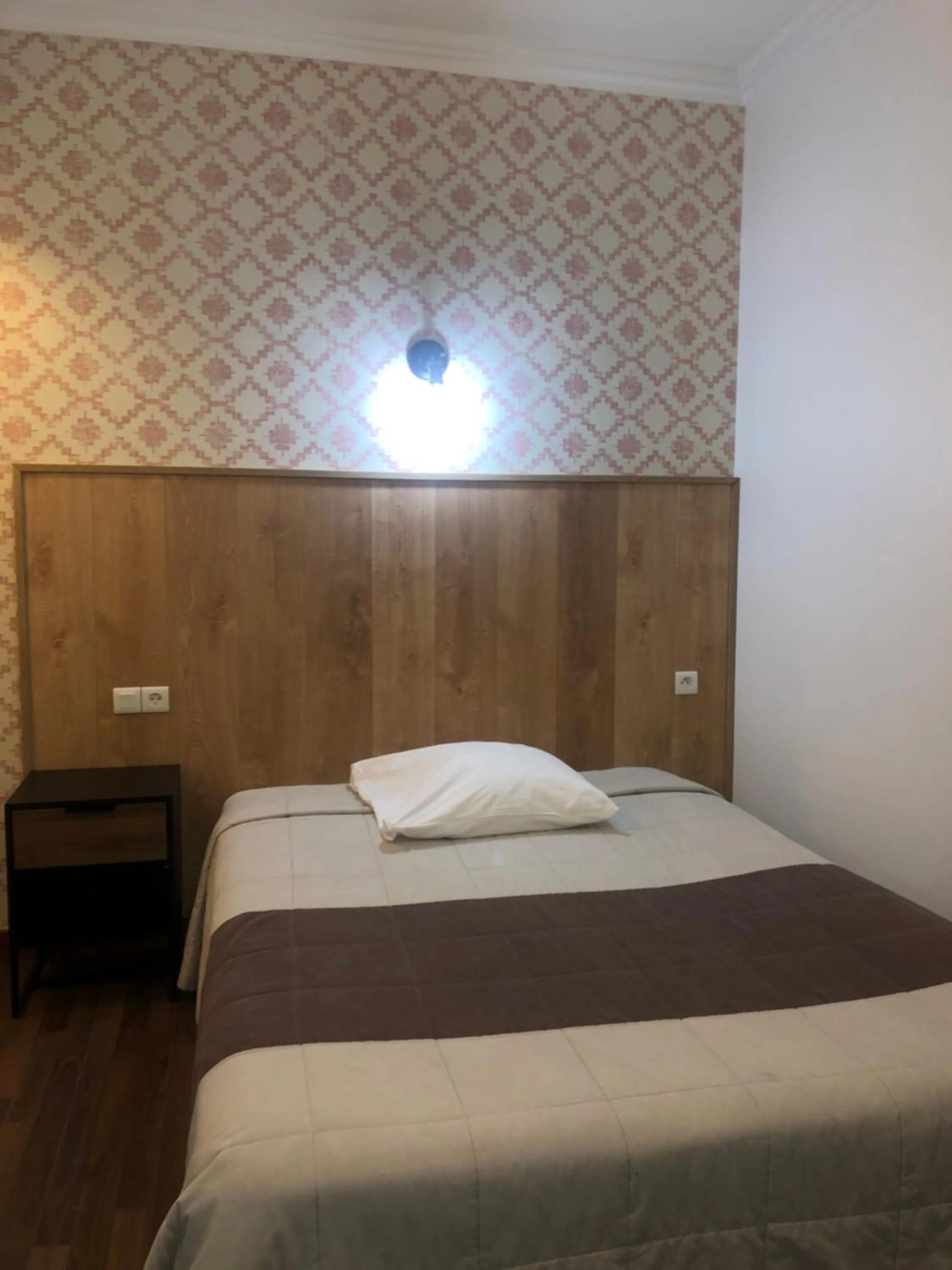 Bed in Hôtel Résidence Champerret