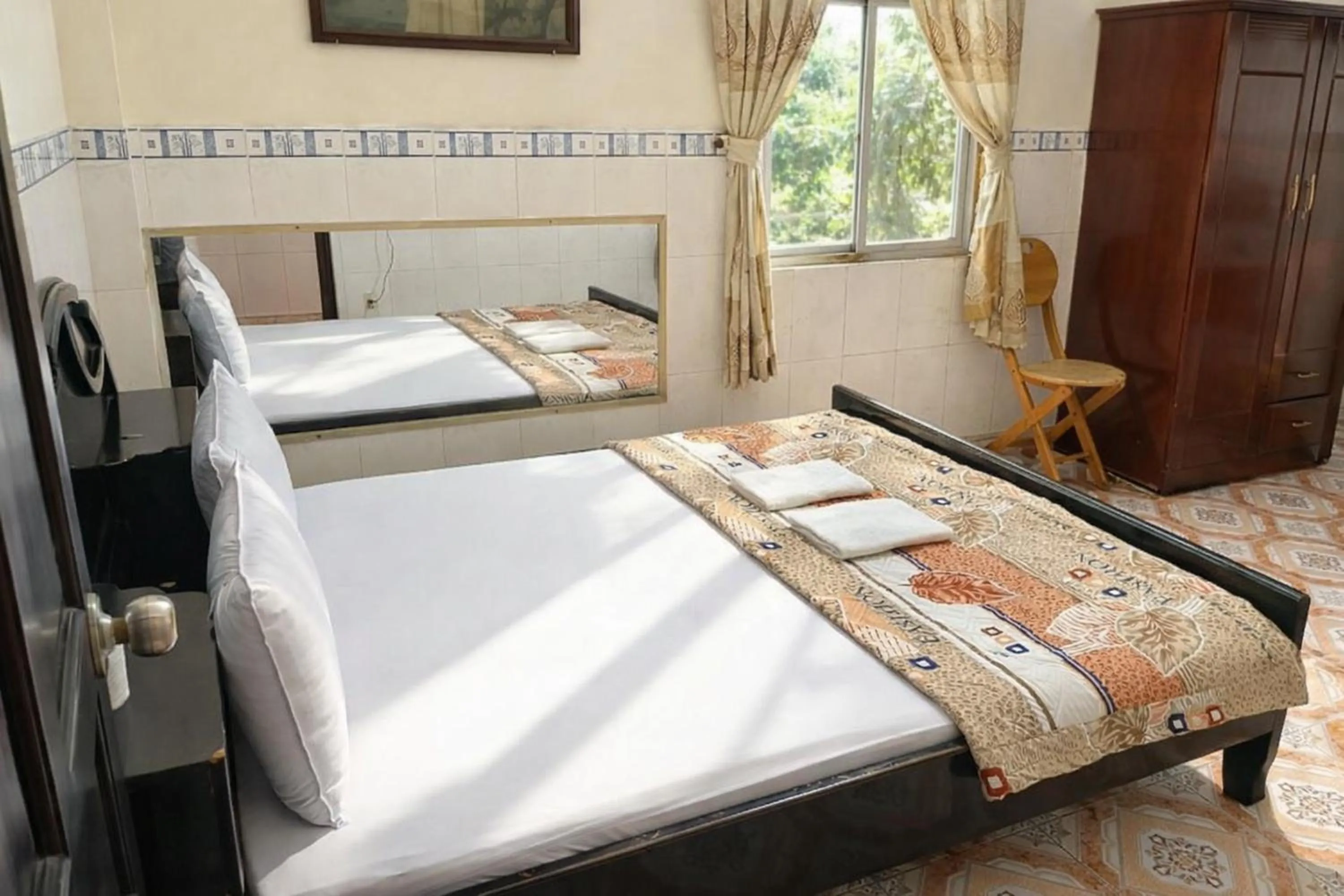 Photo of the whole room, Bed in QUỲNH HOA HOTEL