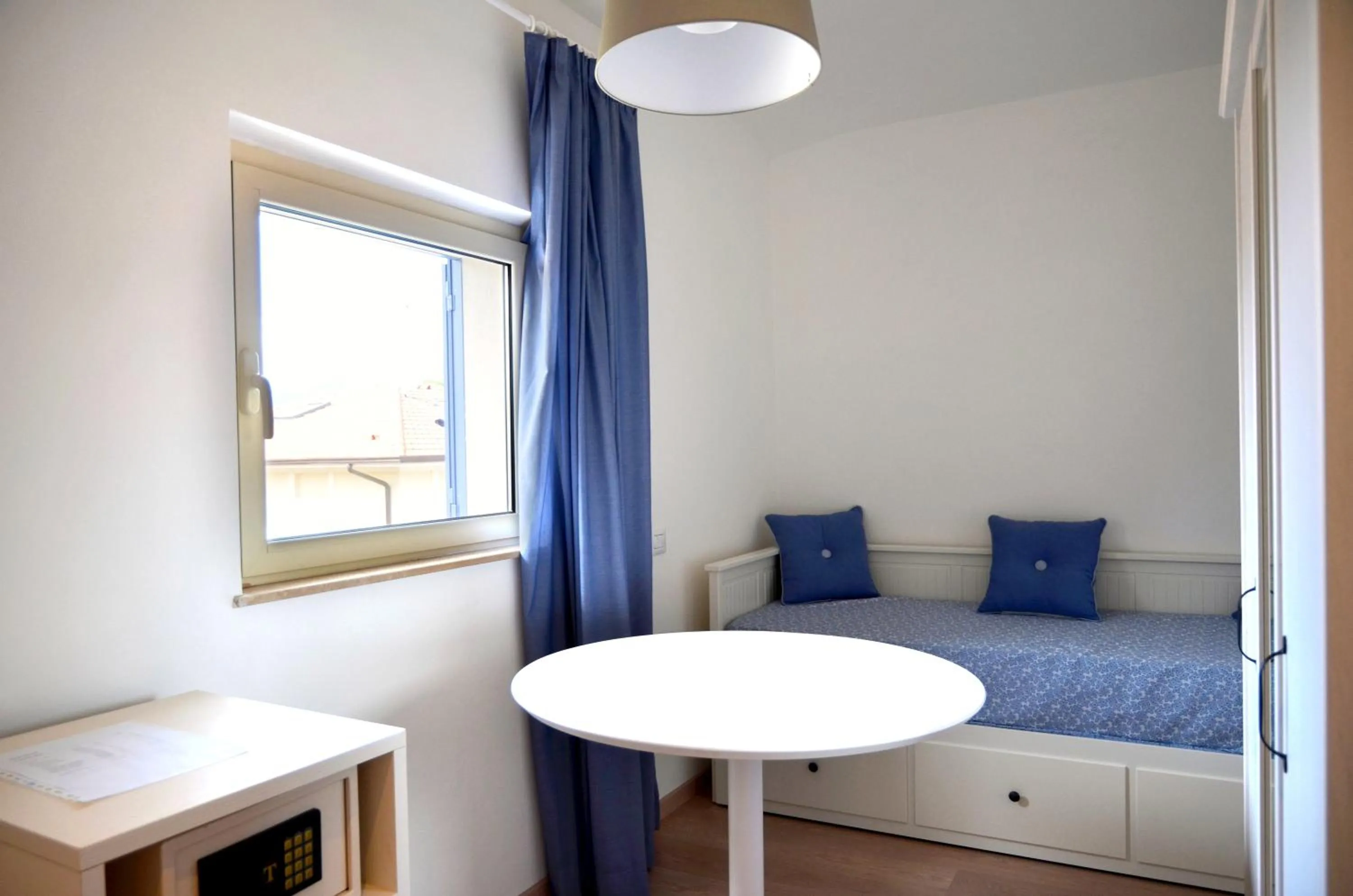 Photo of the whole room, Bed in Petit Hotel
