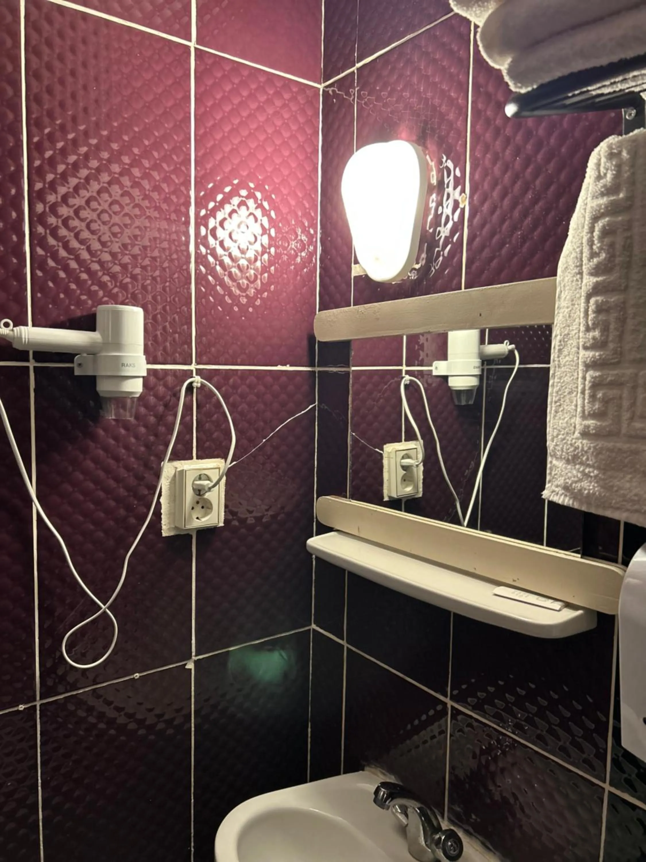 Shower in Cord Hotel & Resort