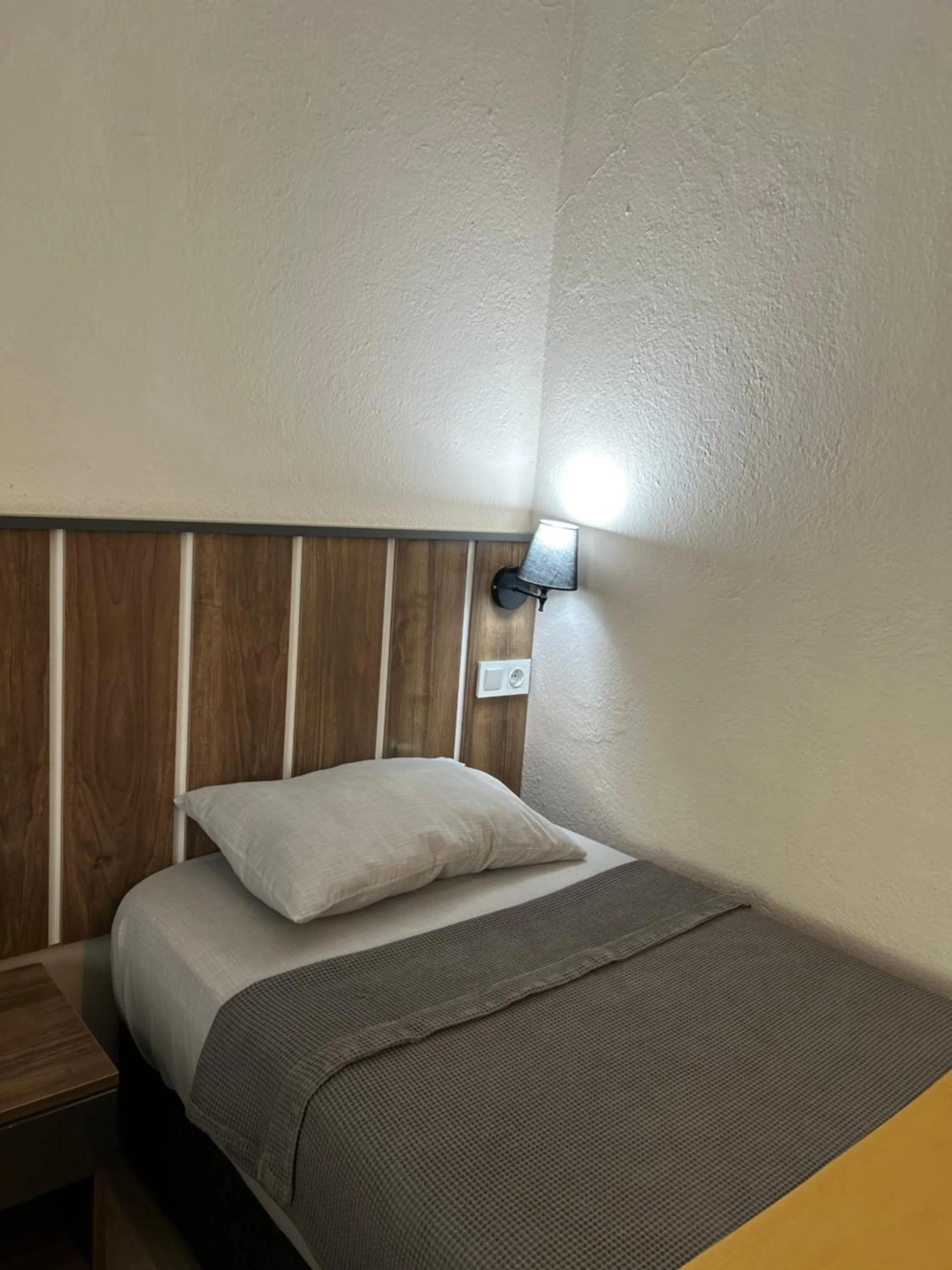 Bed in Cord Hotel & Resort