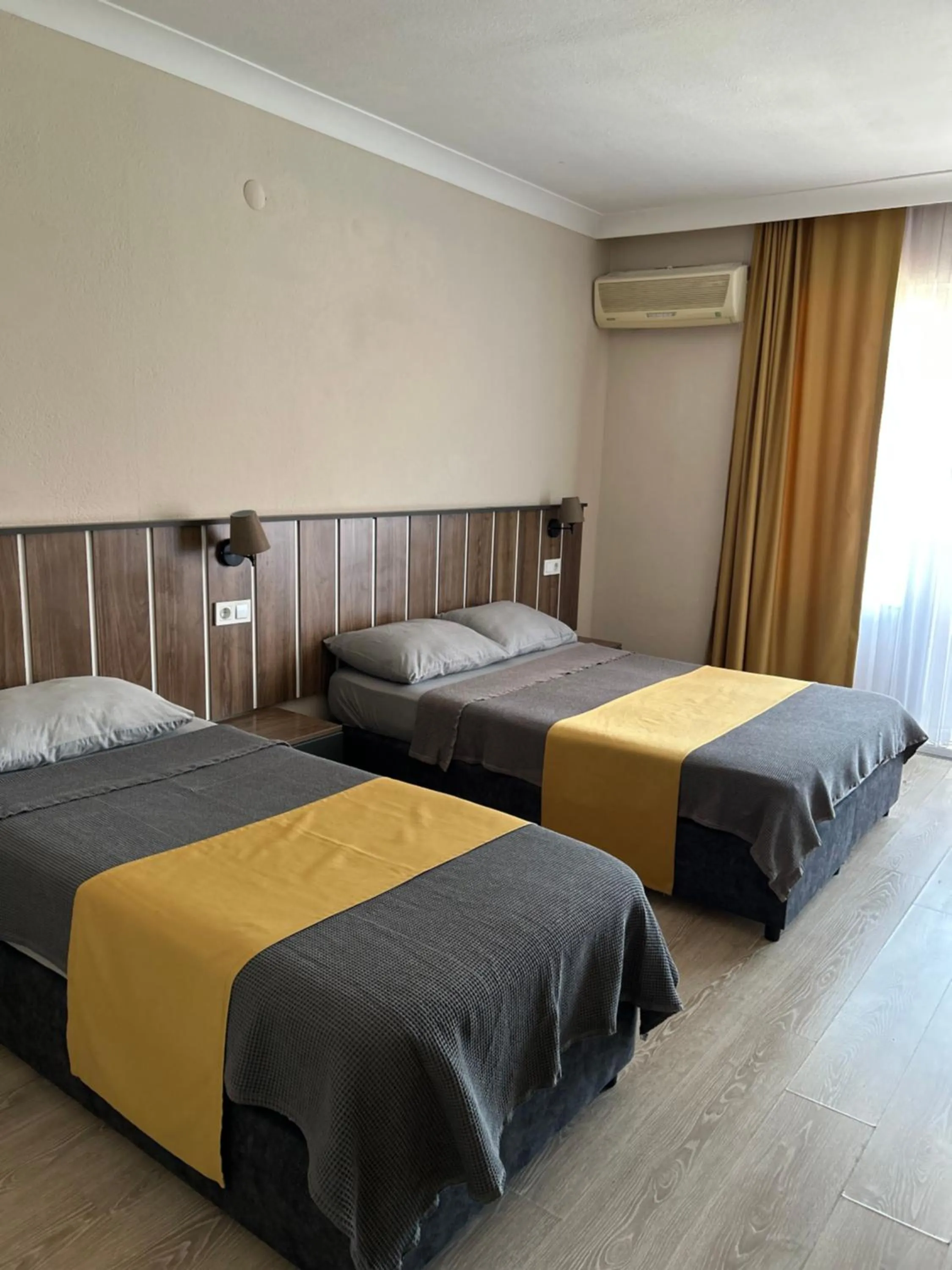 Bed in Cord Hotel & Resort