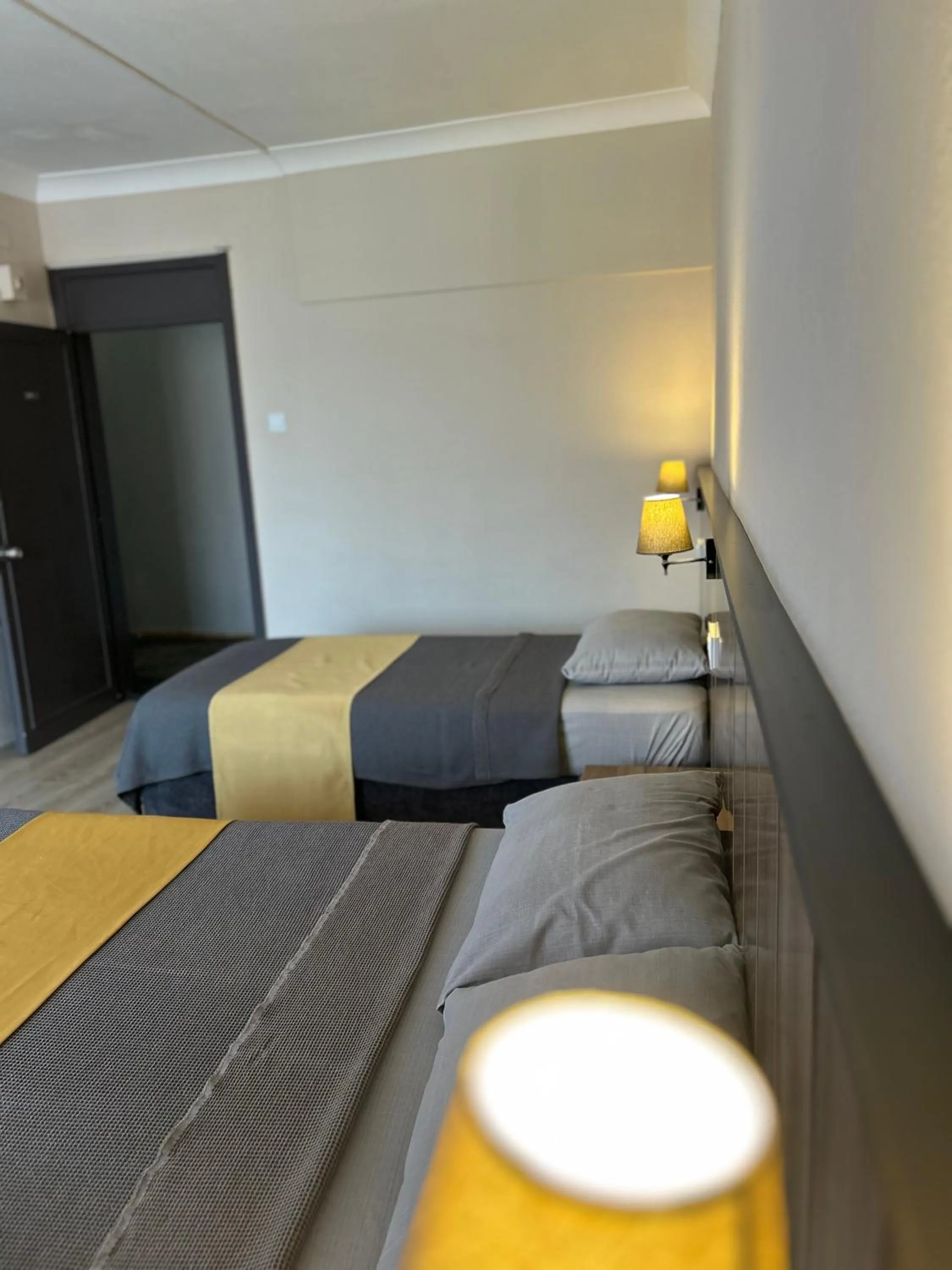 Bed in Cord Hotel & Resort