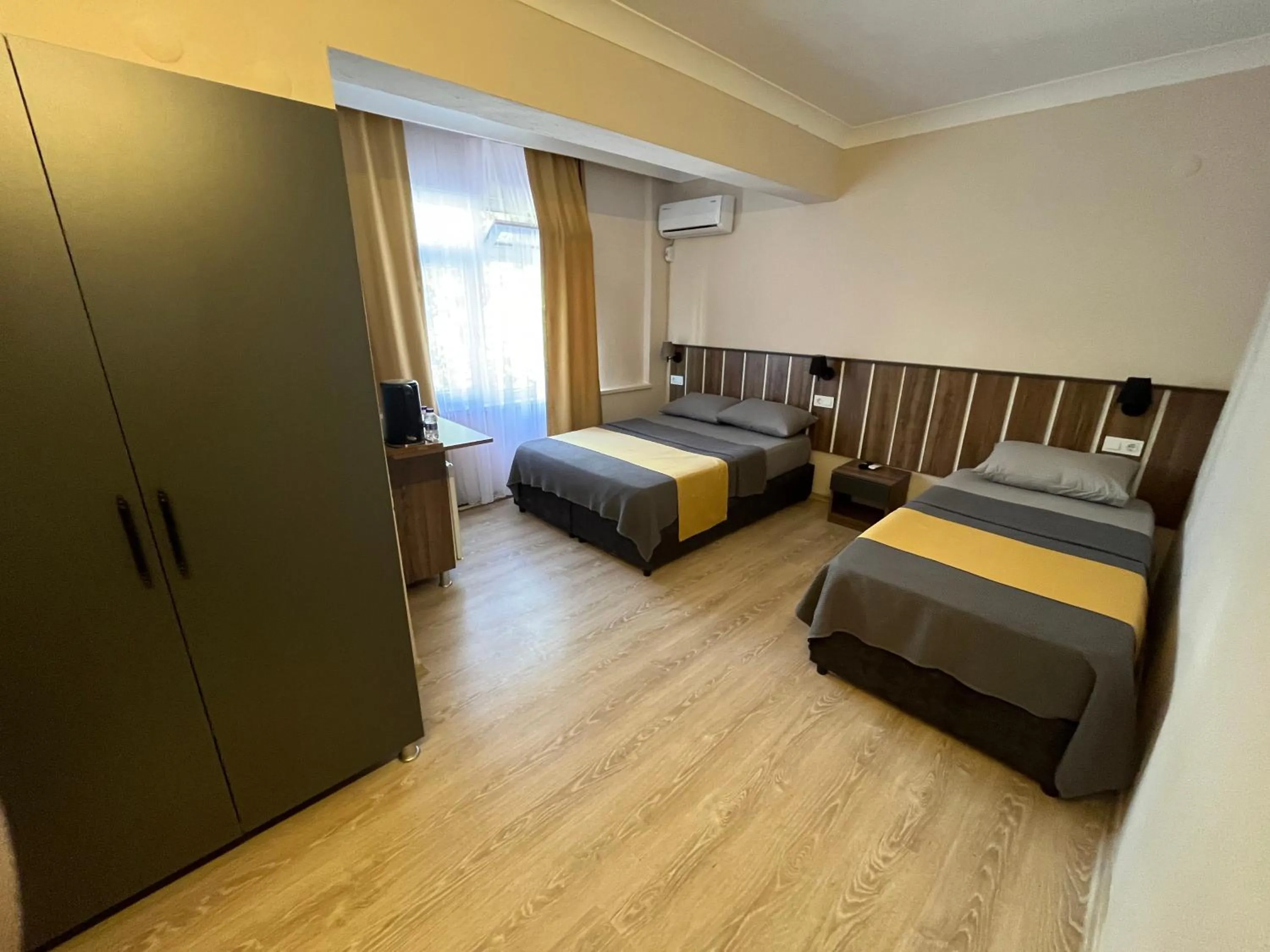 Bed in Cord Hotel & Resort