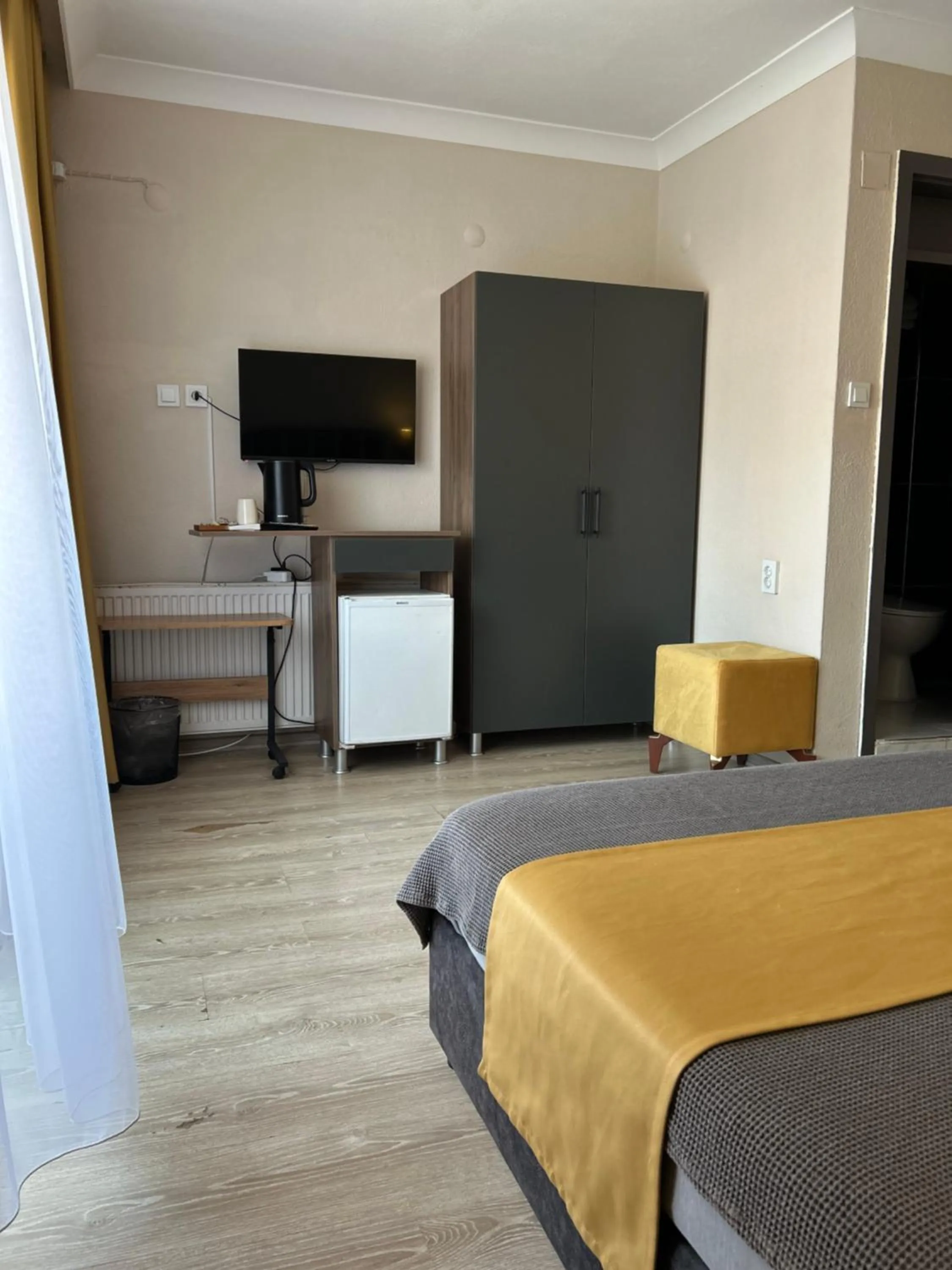 Bed in Cord Hotel & Resort