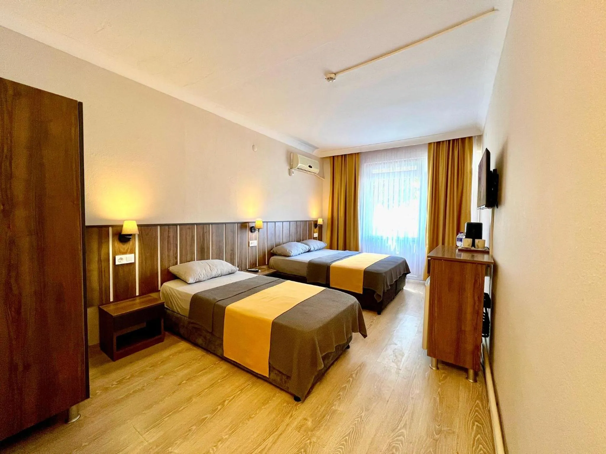 Bed in Cord Hotel & Resort