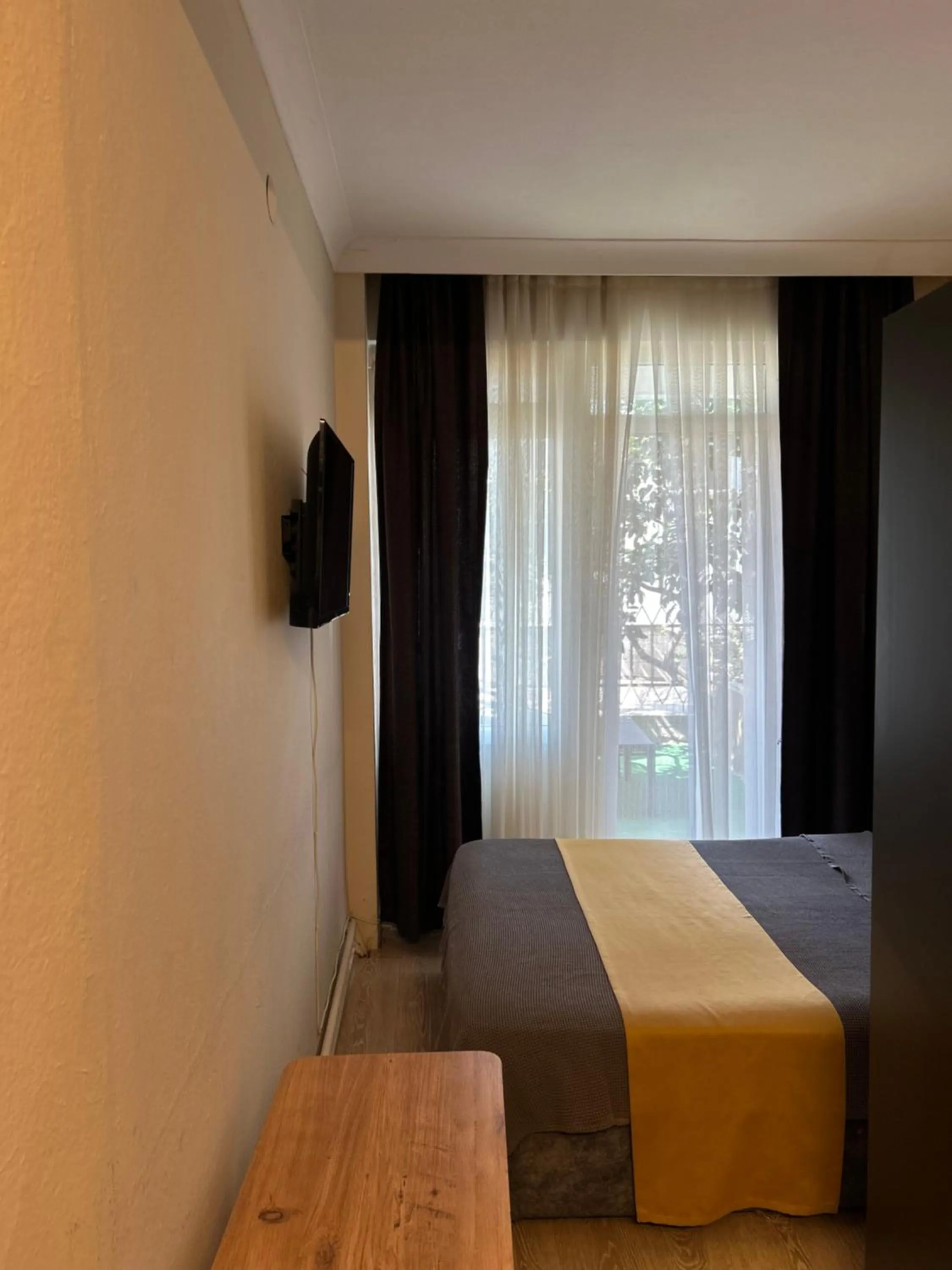 Bed in Cord Hotel & Resort