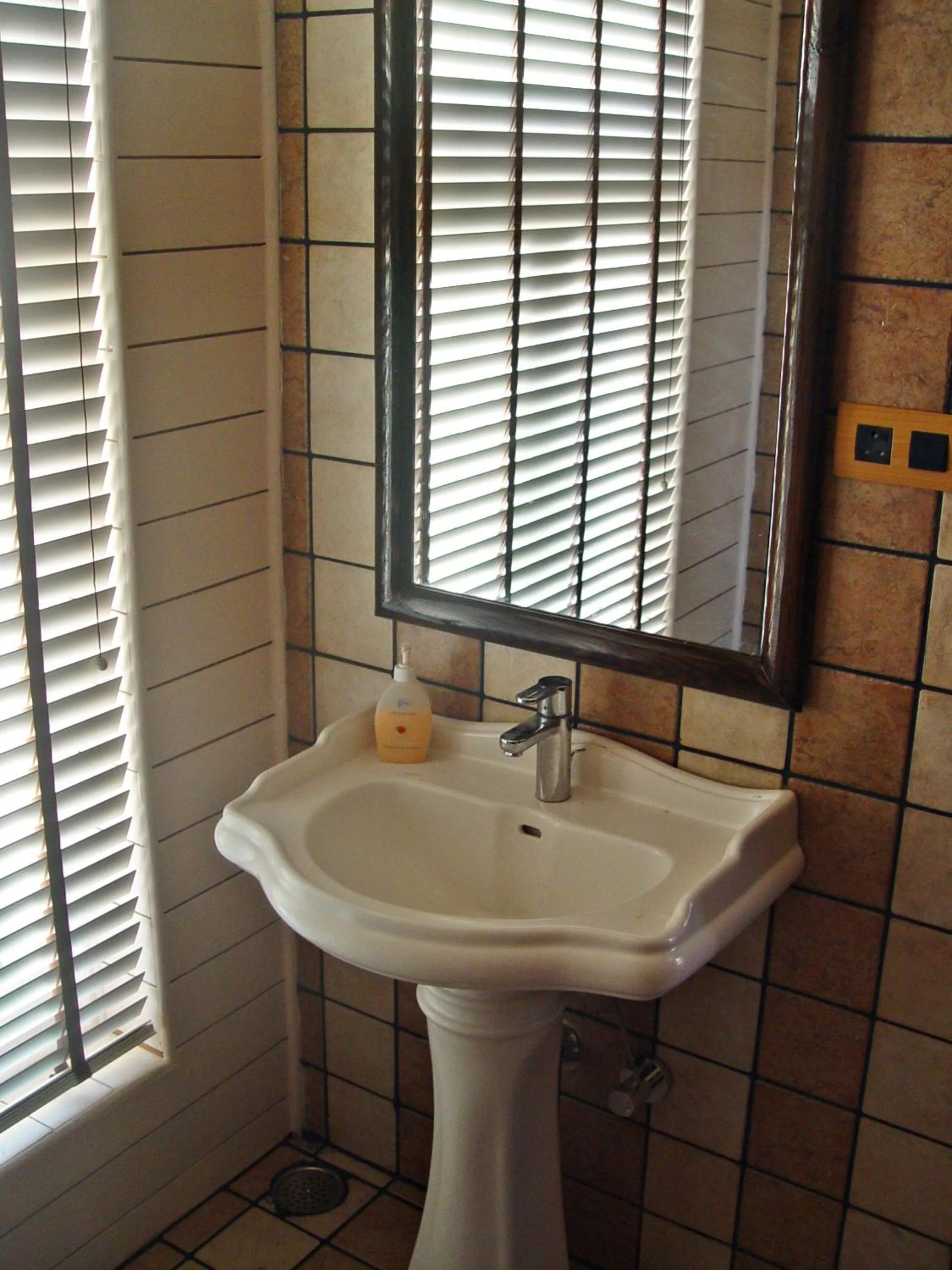 Bathroom in The GoodFind Residency