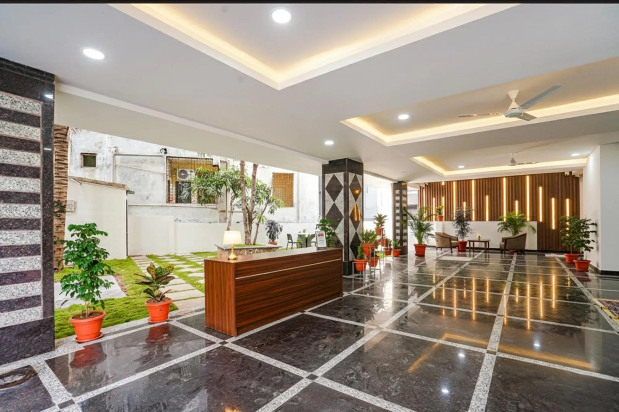 Seating area in FabHotel Rooms 27 - Nr Hitech City