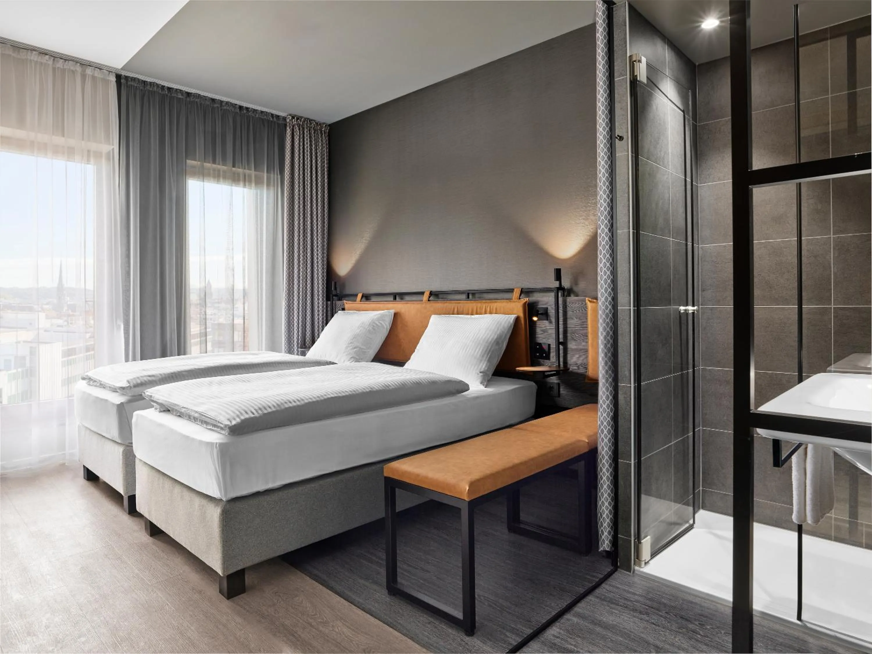 Bed in H2 Hotel Saarbrücken