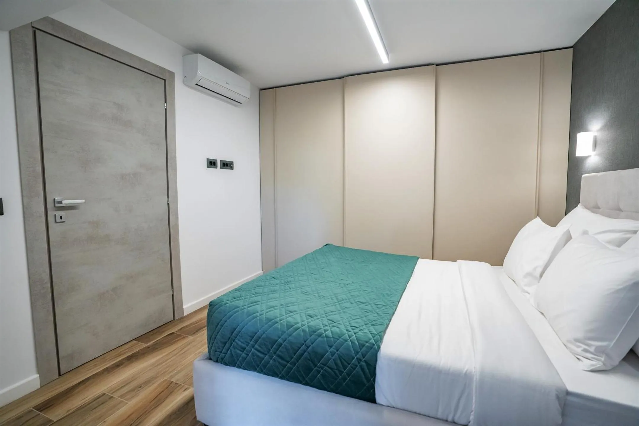 Bed in NOVOS ApartHotel